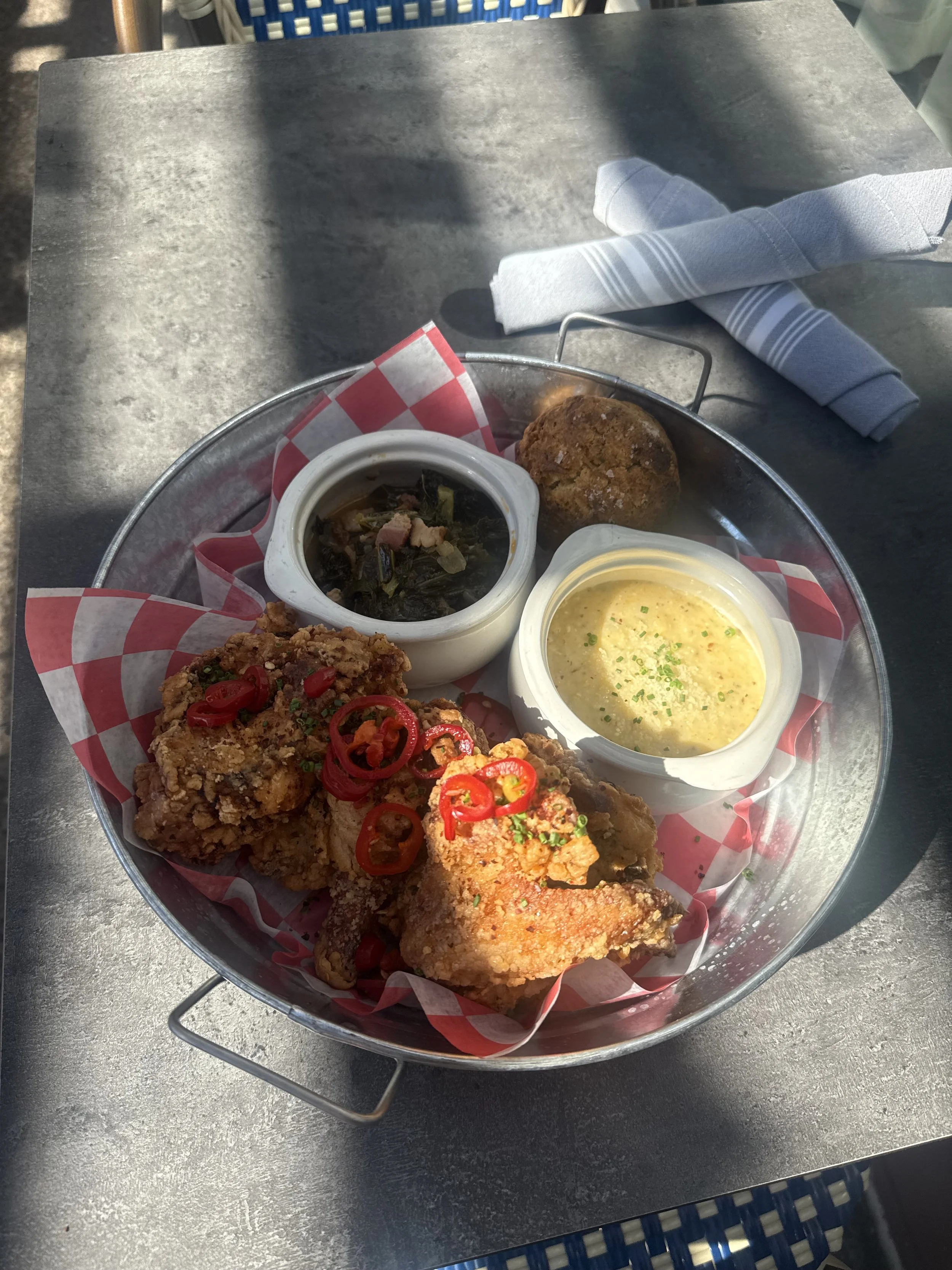 Sign advertising gluten-free fried chicken available only on Wednesday nights with a picture of fried chicken on a plate.