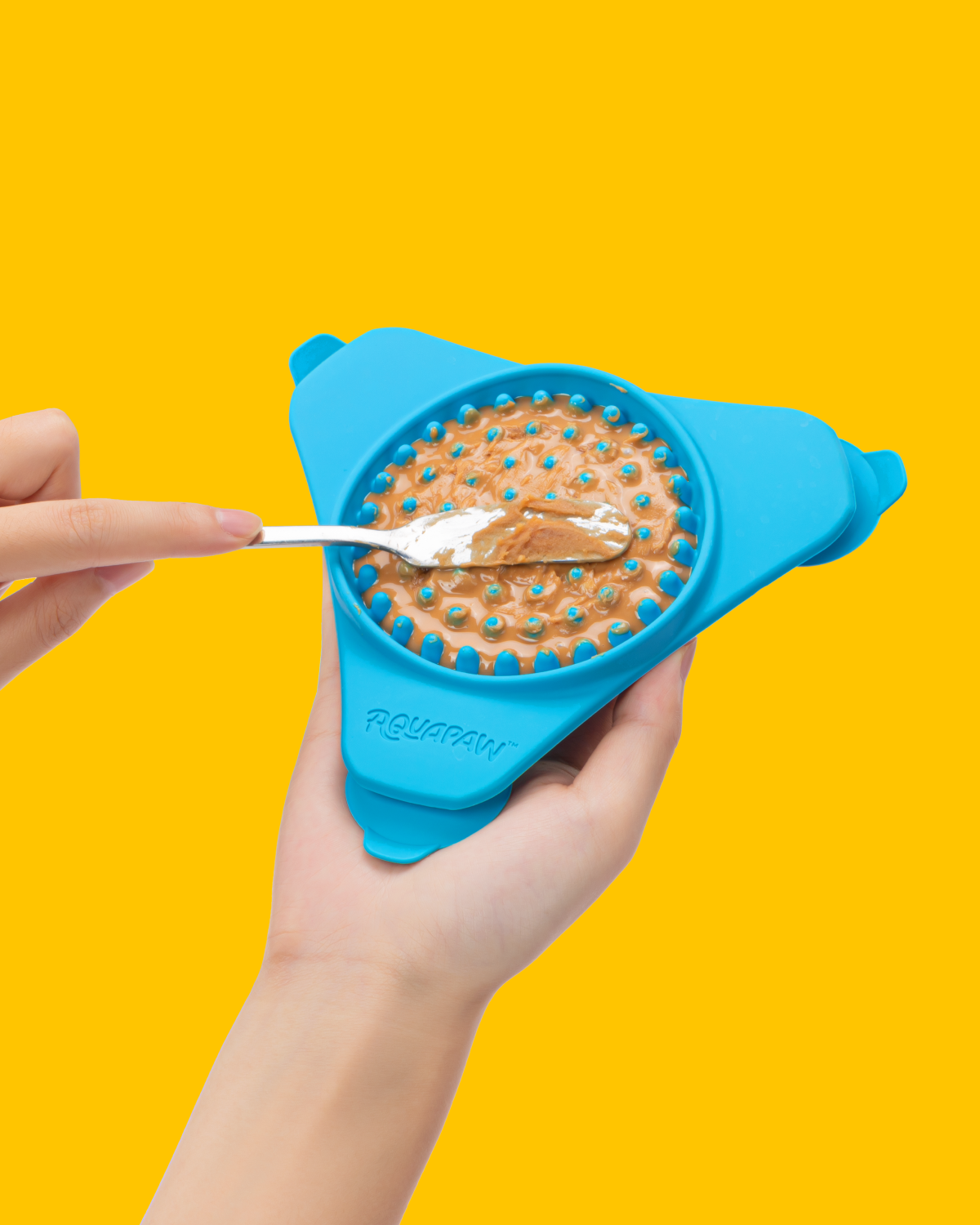 Lick mat on yellow.png