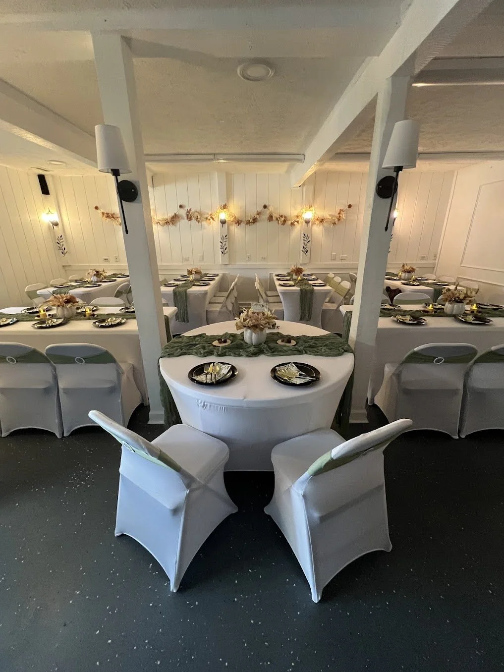 Tables set for a private gathering in the main room
