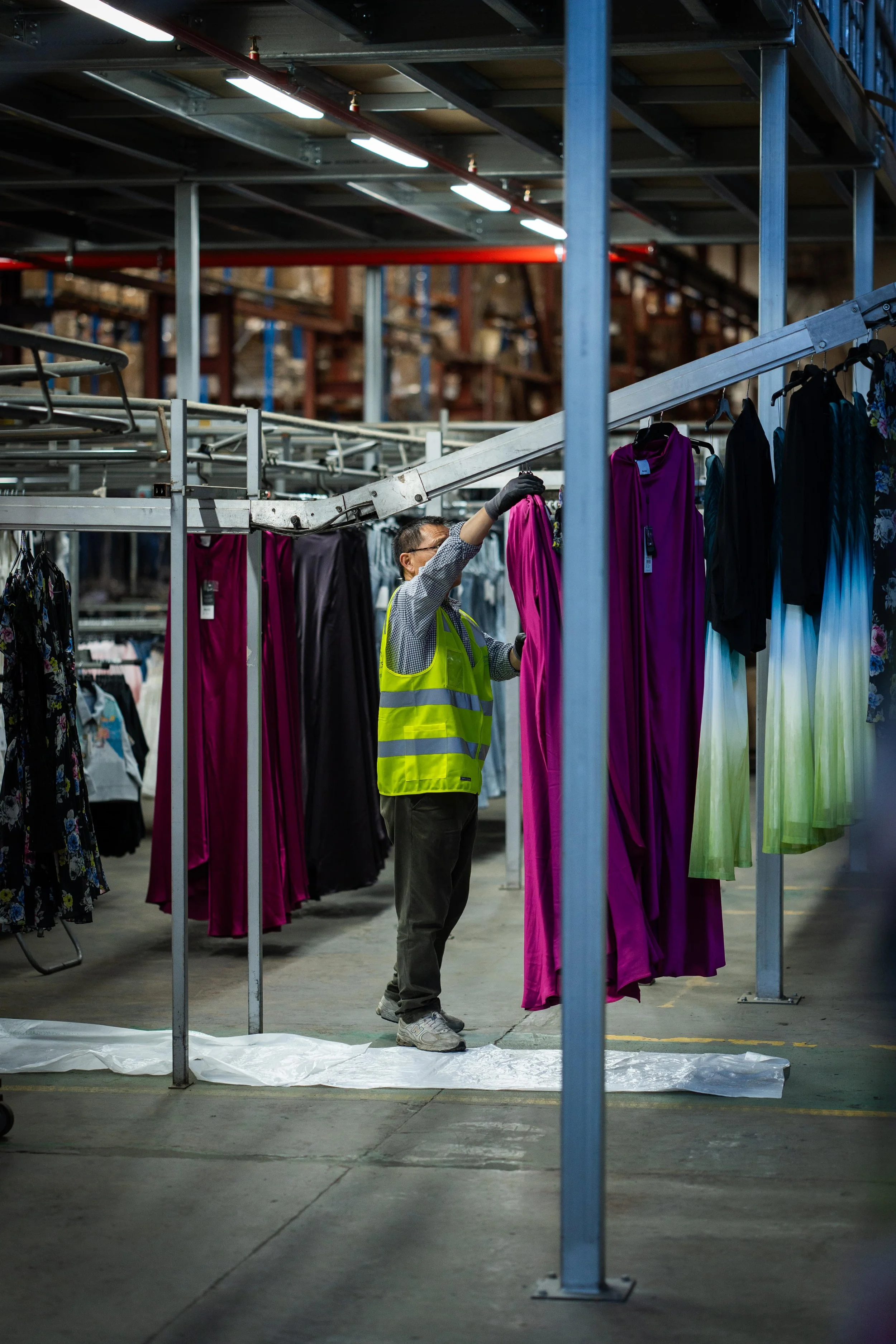 using our state of the art steaming tunnel to steam dresses tobe in perfect condition for retail