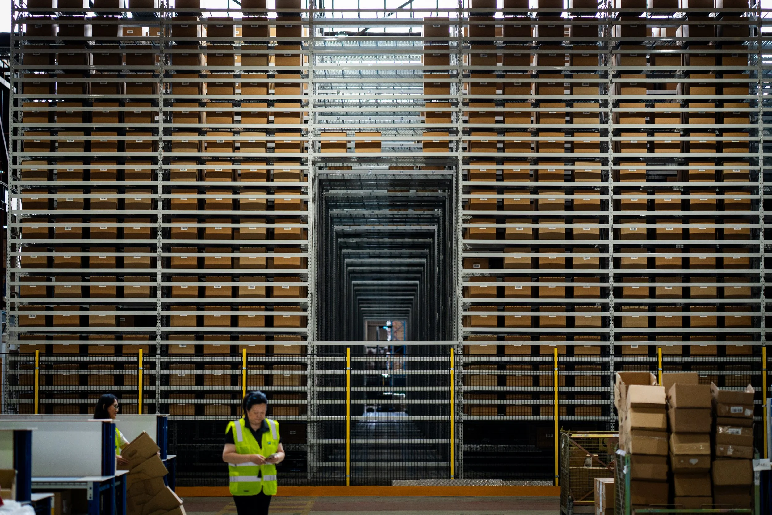 Wide angle shot of a clean and synchronized automation system to deliver the most accurate and rapid picking/dispatch system.