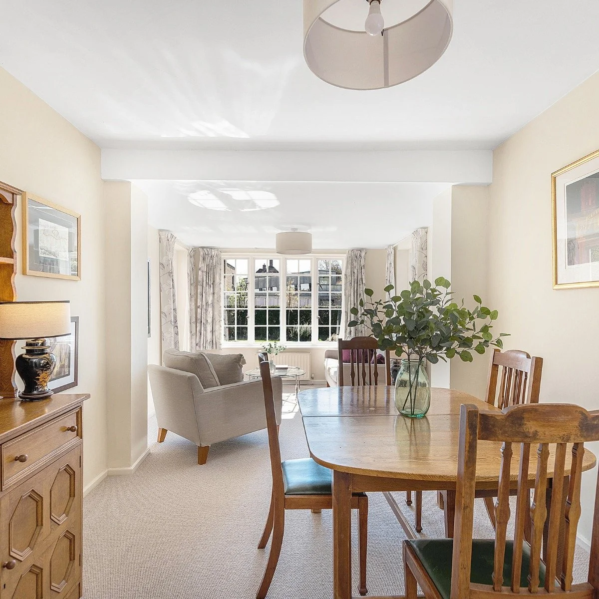 How do you dress a lived-in home?

In this case, the owners were dividing their time between their old house and their new one, leaving the property they wanted to sell only partly furnished. It still needed to function as a home, though, so I filled