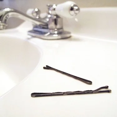 This kind of object is an invitation for a playful cat, but can wreak havoc on your sink drain.