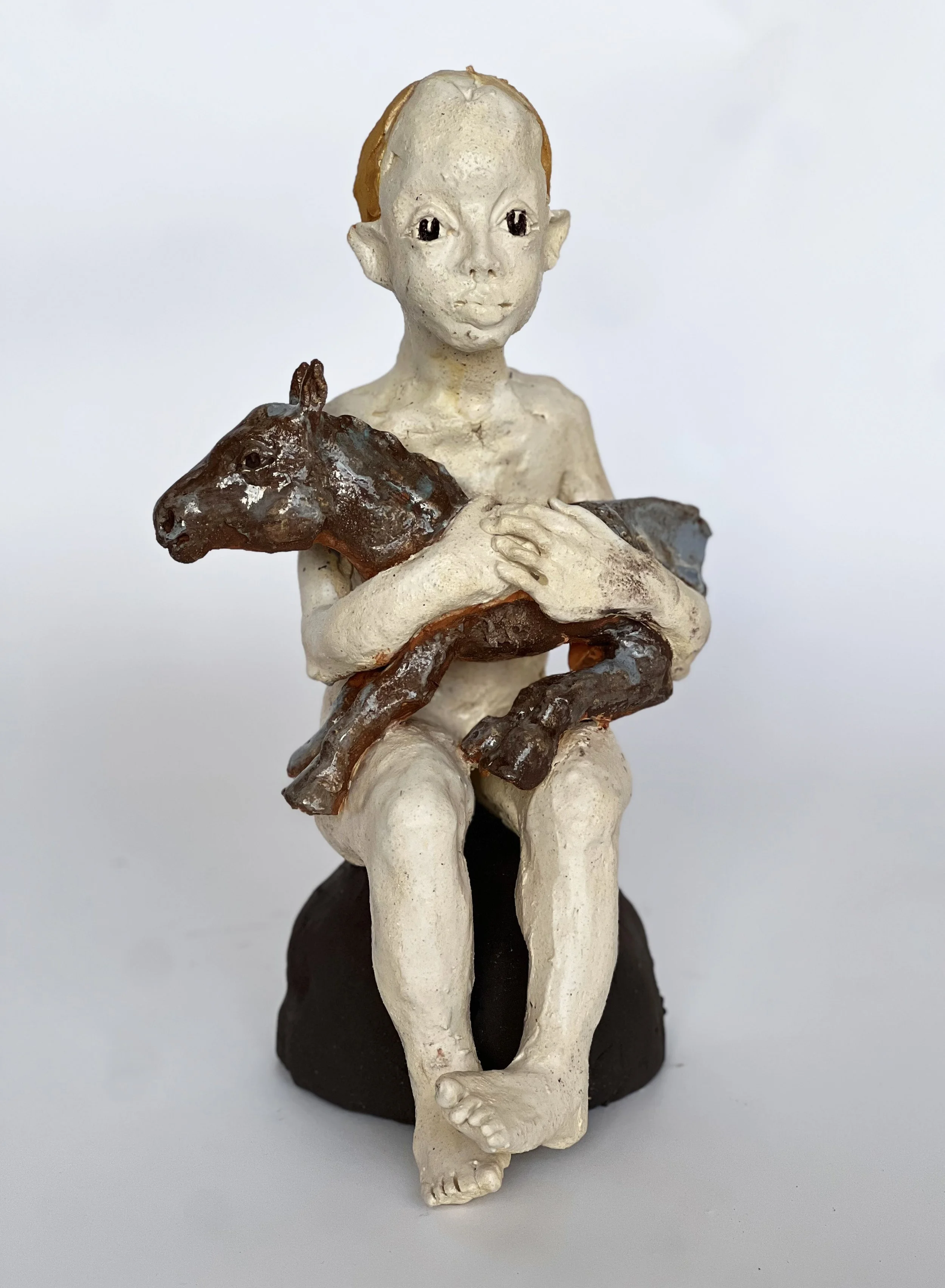 Le garçon et le petit cheval 37X23X23.jpg