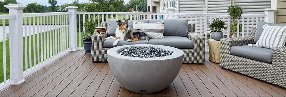 Dog Sitting on a outdoor sofa on a new deck