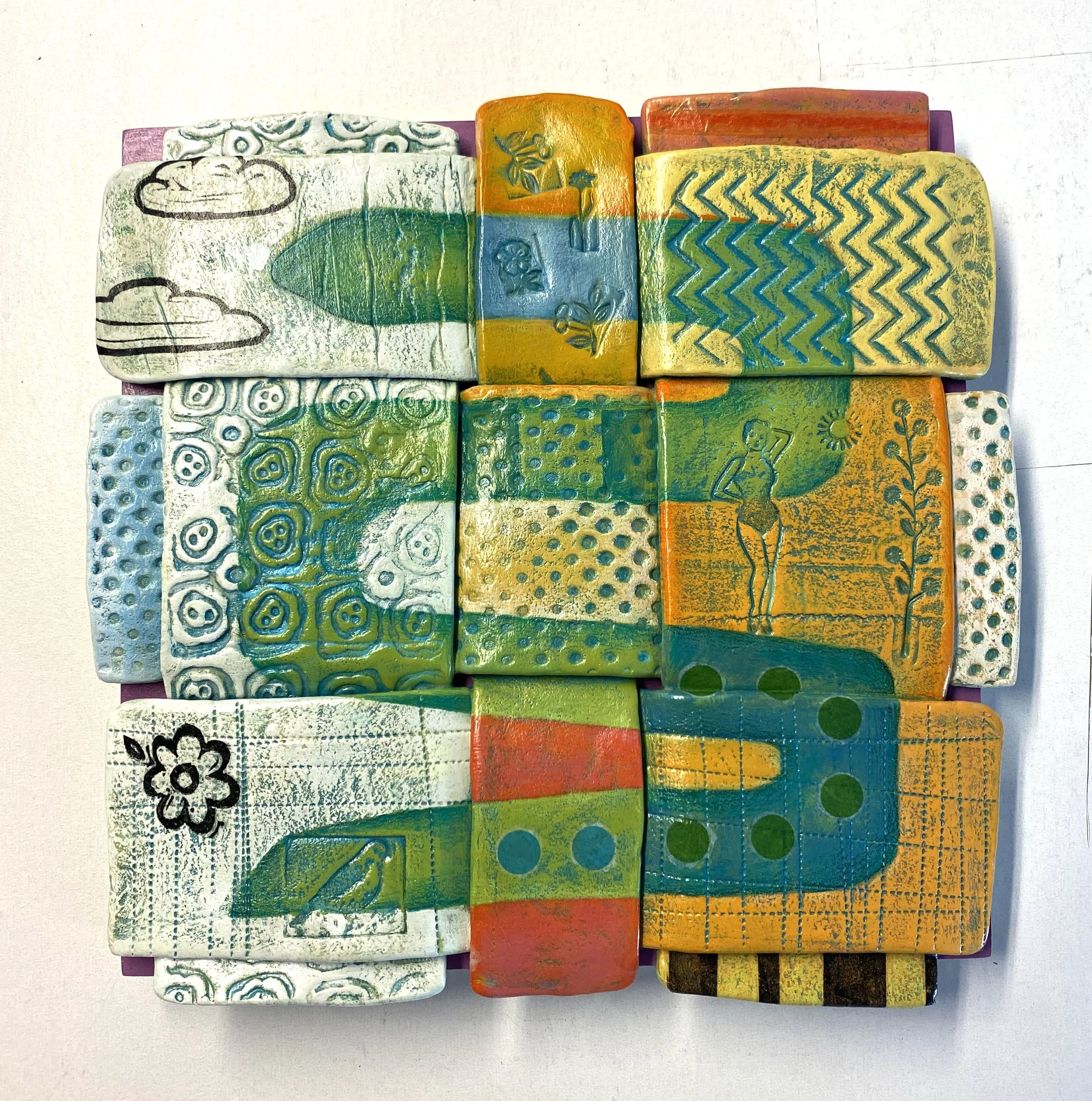 TRANSFORMATION   |   paper clay with acrylic and collage   |   11" x 11" x 1.5"