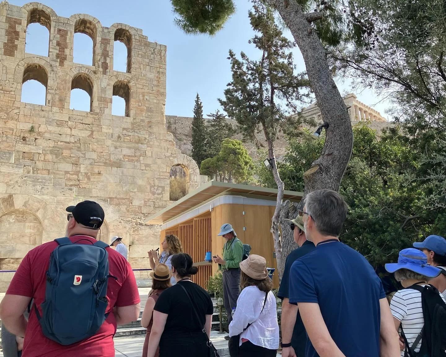 Katerina takes us to the Acropolis. First stop at the Odeon.