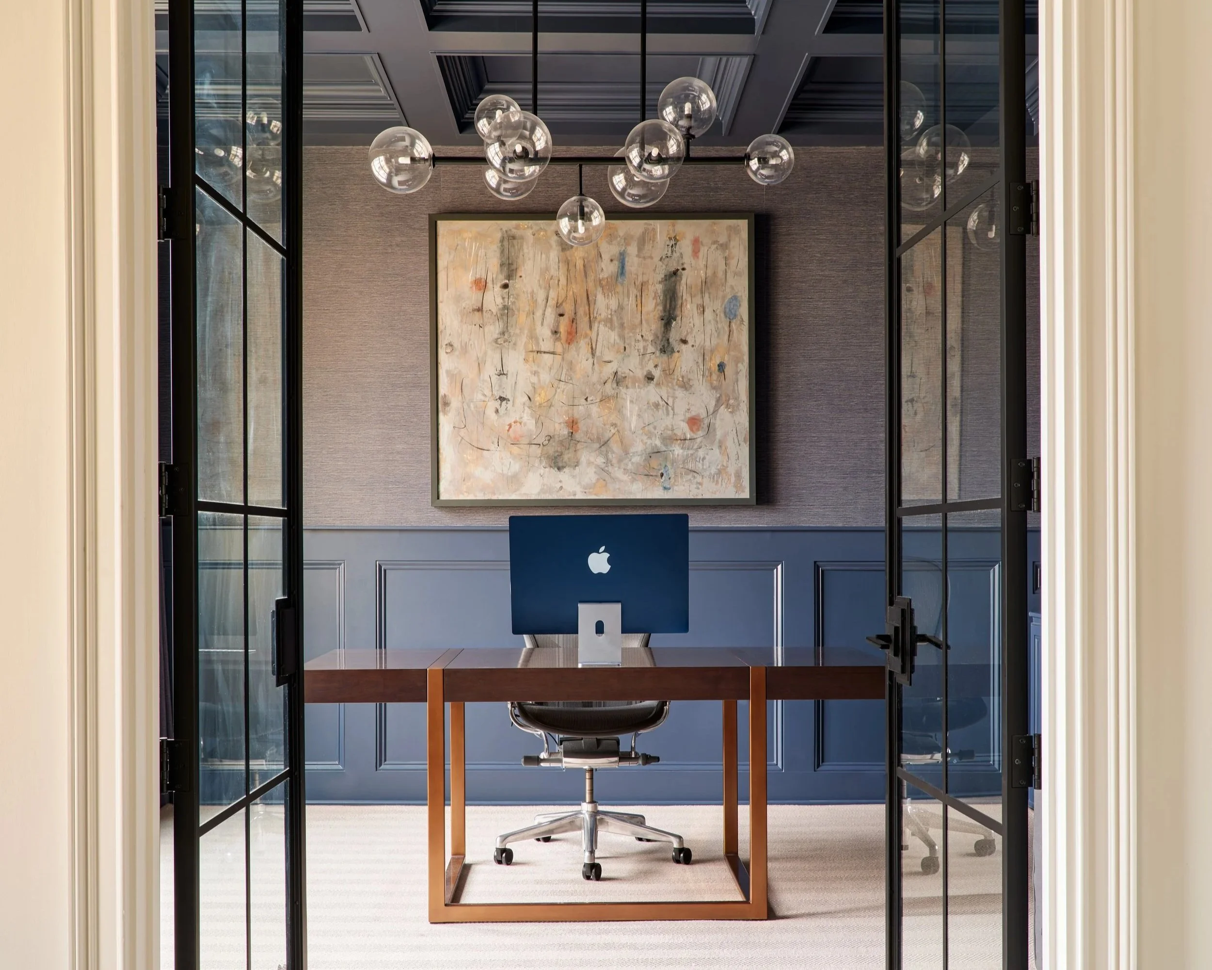 Home office designed with a stylish Zoom background in mind.