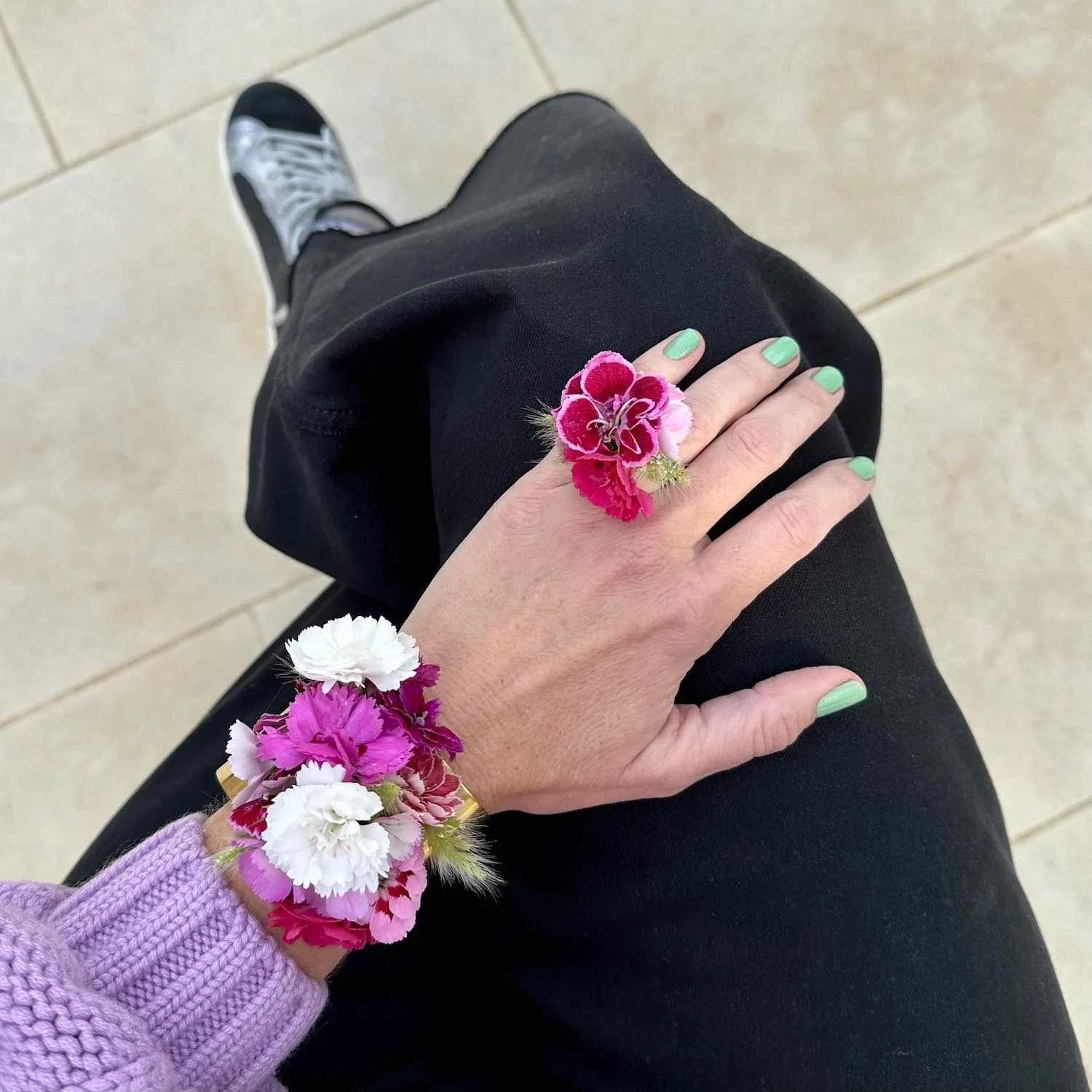 Dianthus Cuff and Ring made with eleven varieties of dianthus and a little millet grass.