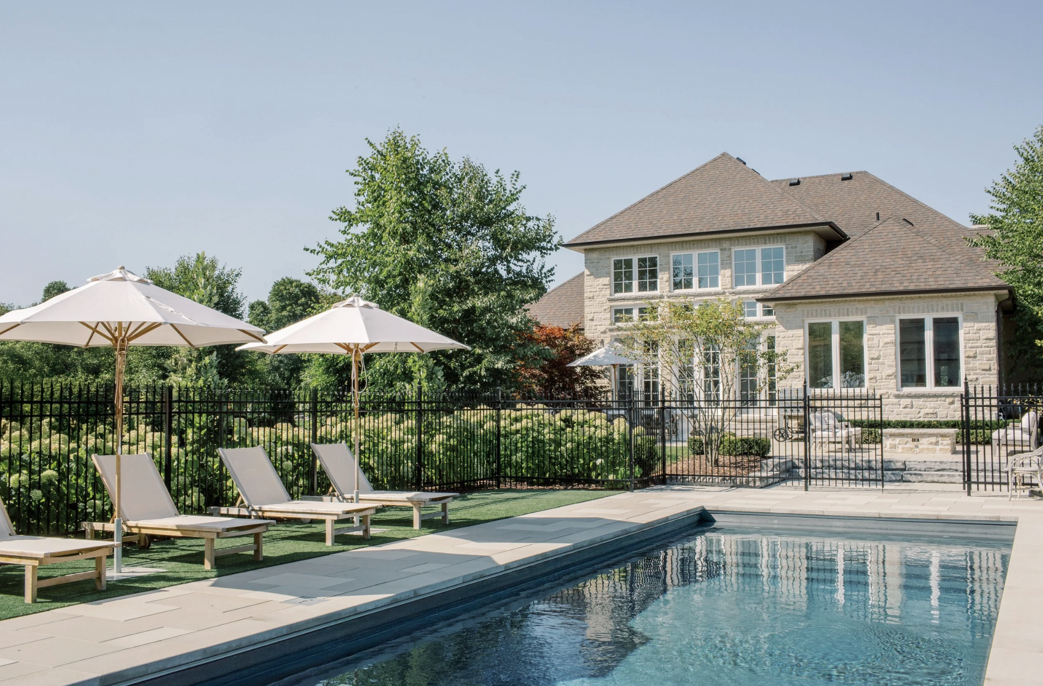 Timeless by Design: A Classic Estate with a Private Pool House