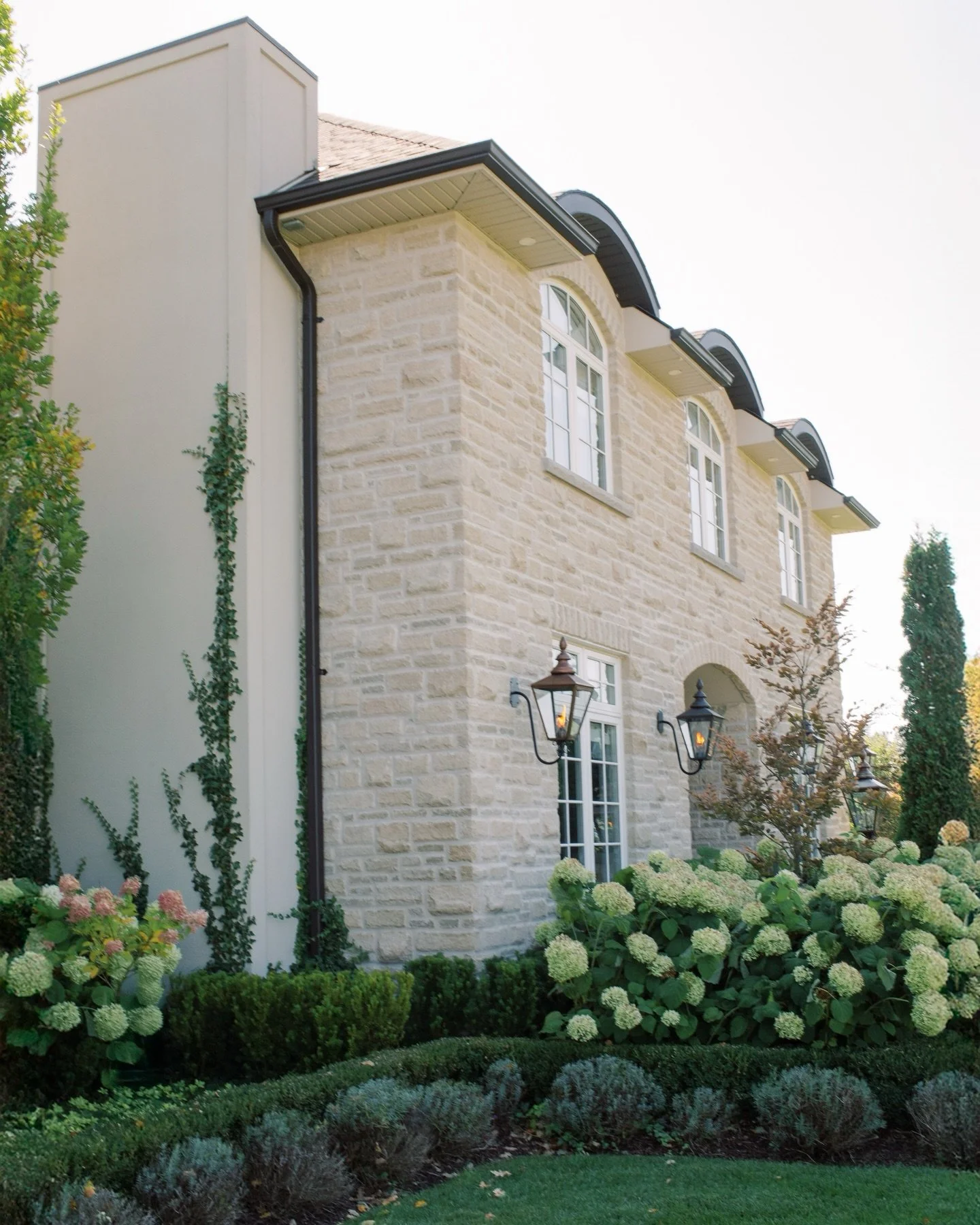 This home is a reminder that timeless design always wins.

We built this estate several years ago and it continues to be one of our favourite projects. The stone architecture, layered landscaping, and pool house retreat create a backyard that feels l