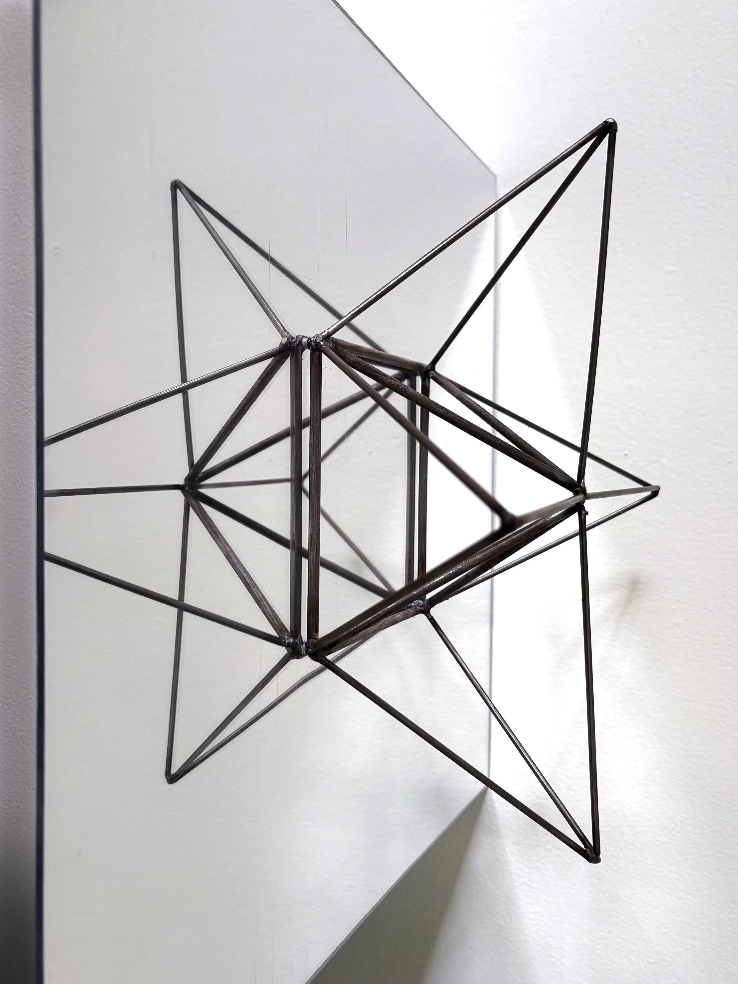 Enough — mild steel, mirrored acrylic — 
16 ½” x 16 ½” x 4 ⅜”