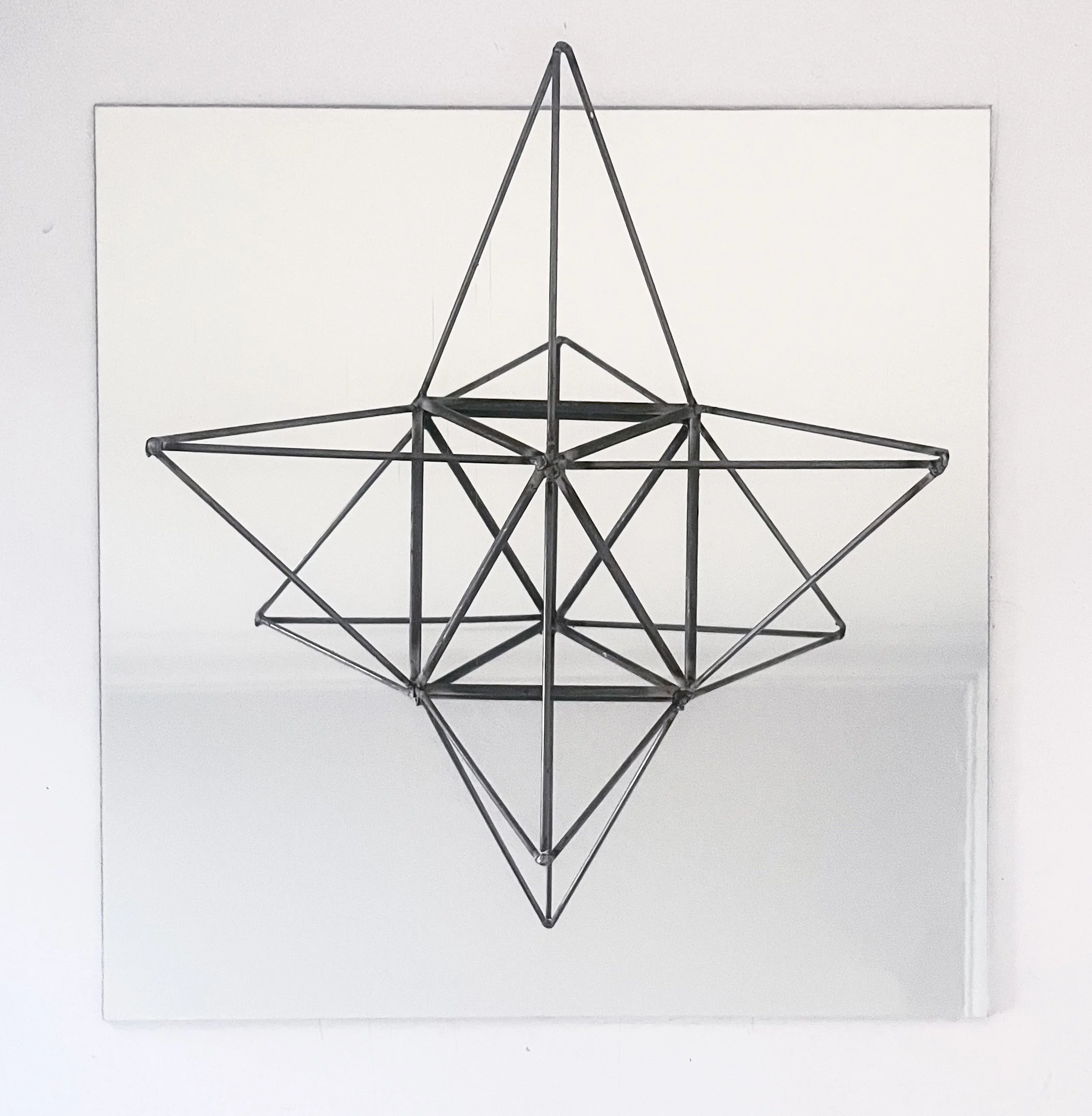 Enough — mild steel, mirrored acrylic — 
16 ½” x 16 ½” x 4 ⅜”
