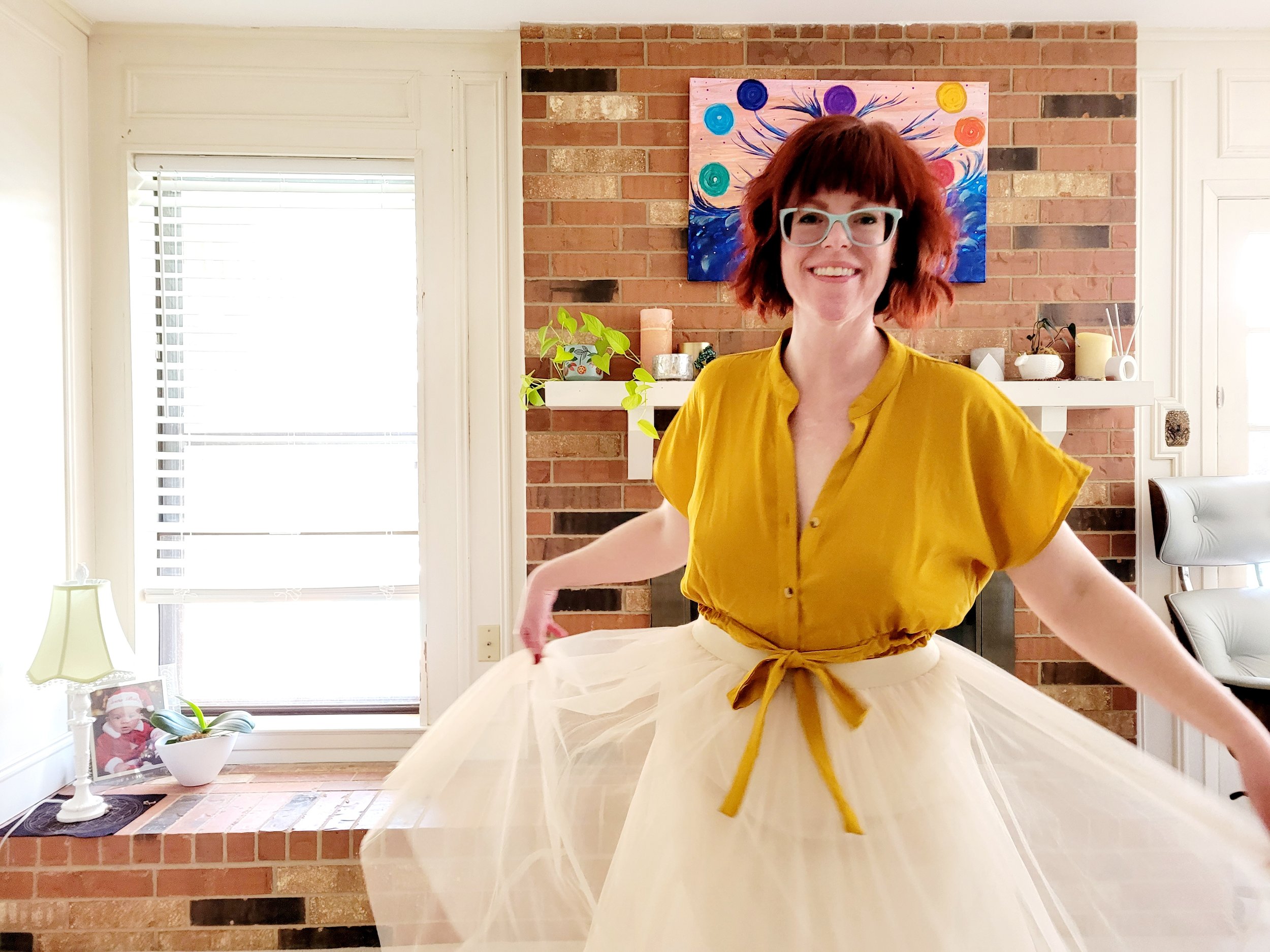 Kate, custom website designer specializing in inclusive websites for therapists and coaches