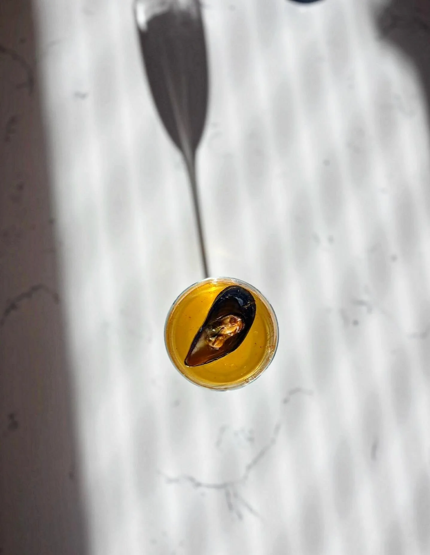 G O L D E N  H O U R ☀️ 

Paella inspired vodka sipper 🍸

toasted rice, tomato, saffron, olive and sherry and a mussel escabeche for good measure.

Cody crushed this fun and savory martini 🫡