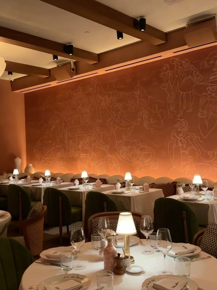 A mural that tells CLAUDIE&rsquo;s story, from sunlit rides along the Riviera to quiet moments at sunset. Discover this piece inside our private dining room, where every detail evokes moments from the South of France ✨🥂