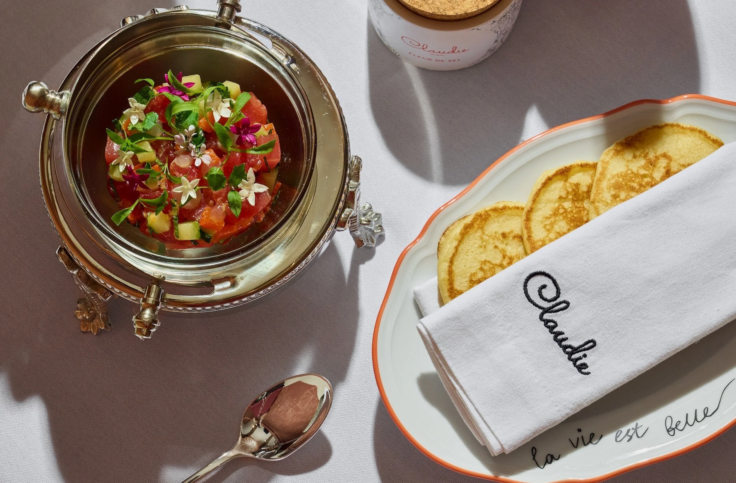 Claudie's lunch menu items on a table.