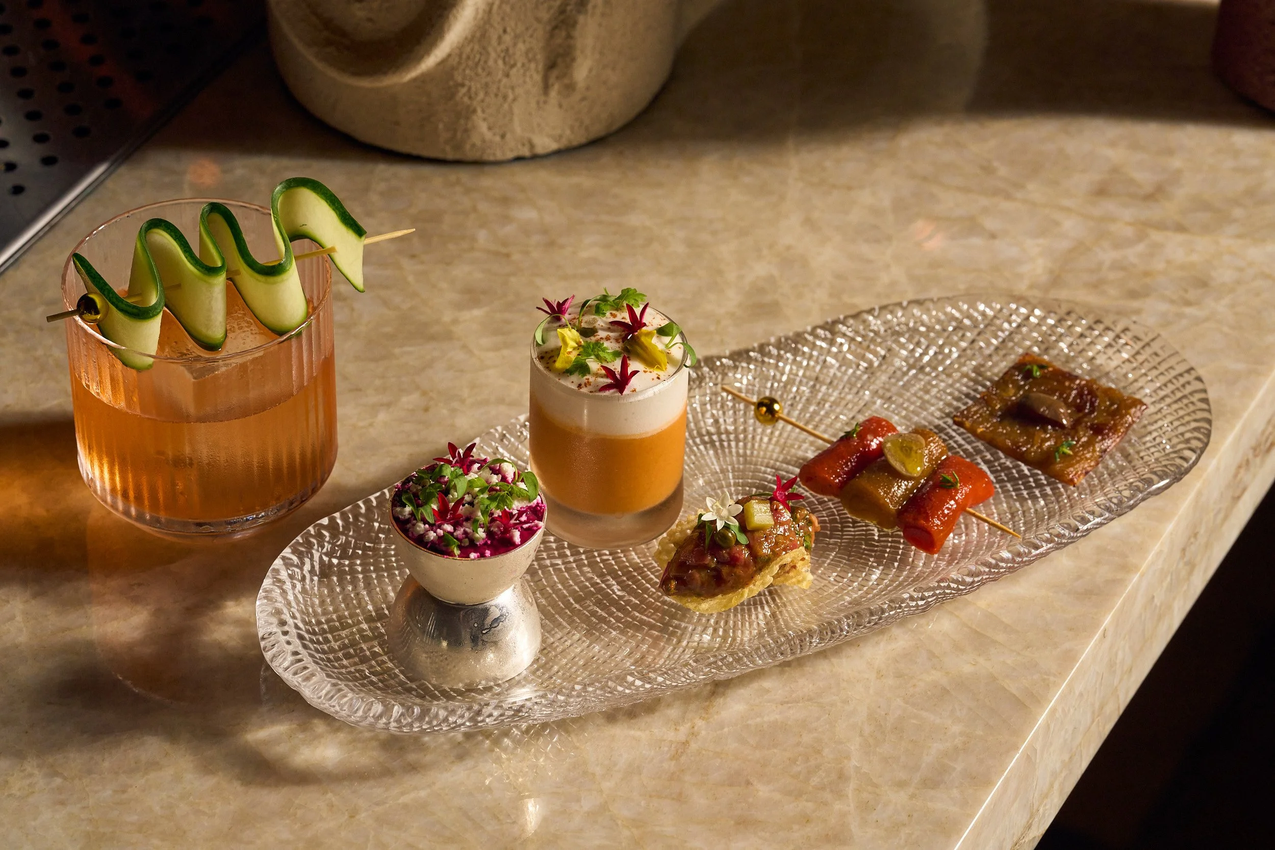 Riviera inspired small bites and a refreshing cocktail for Aperitif time at CLAUDIE.