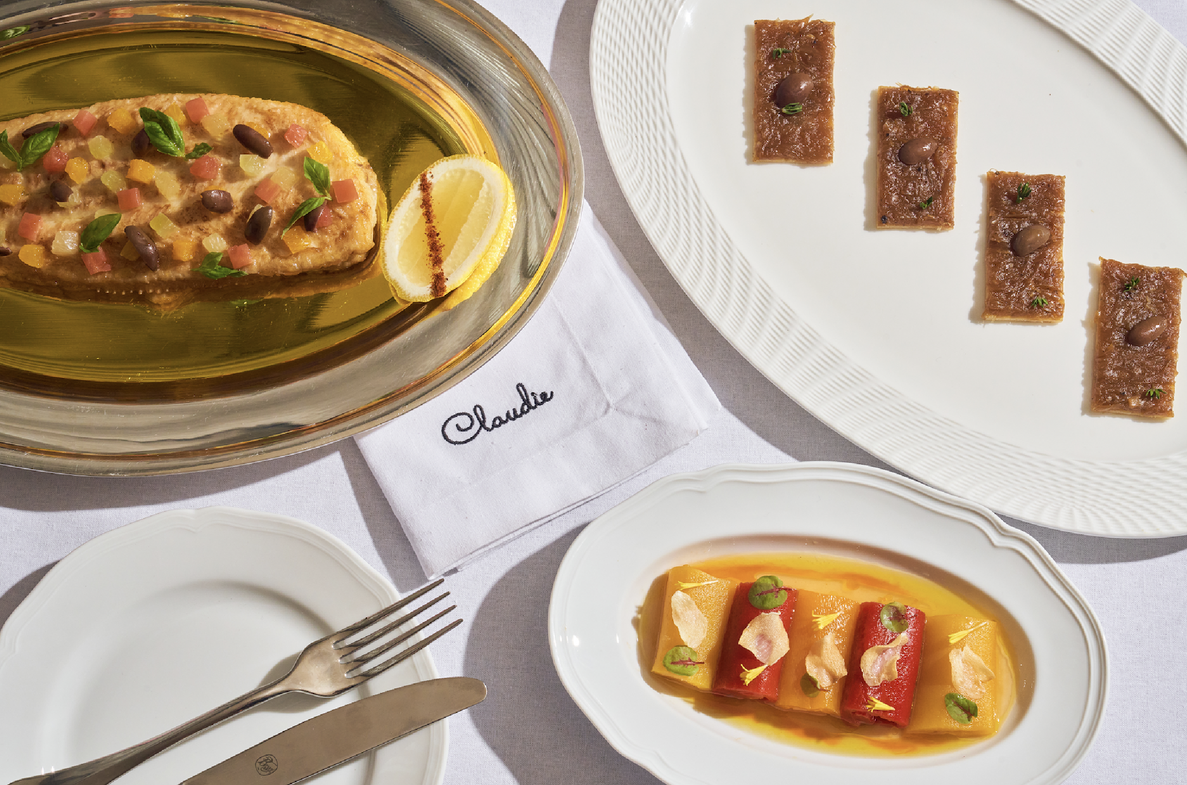 A couple fo CLAUDIE's menu items on a table.