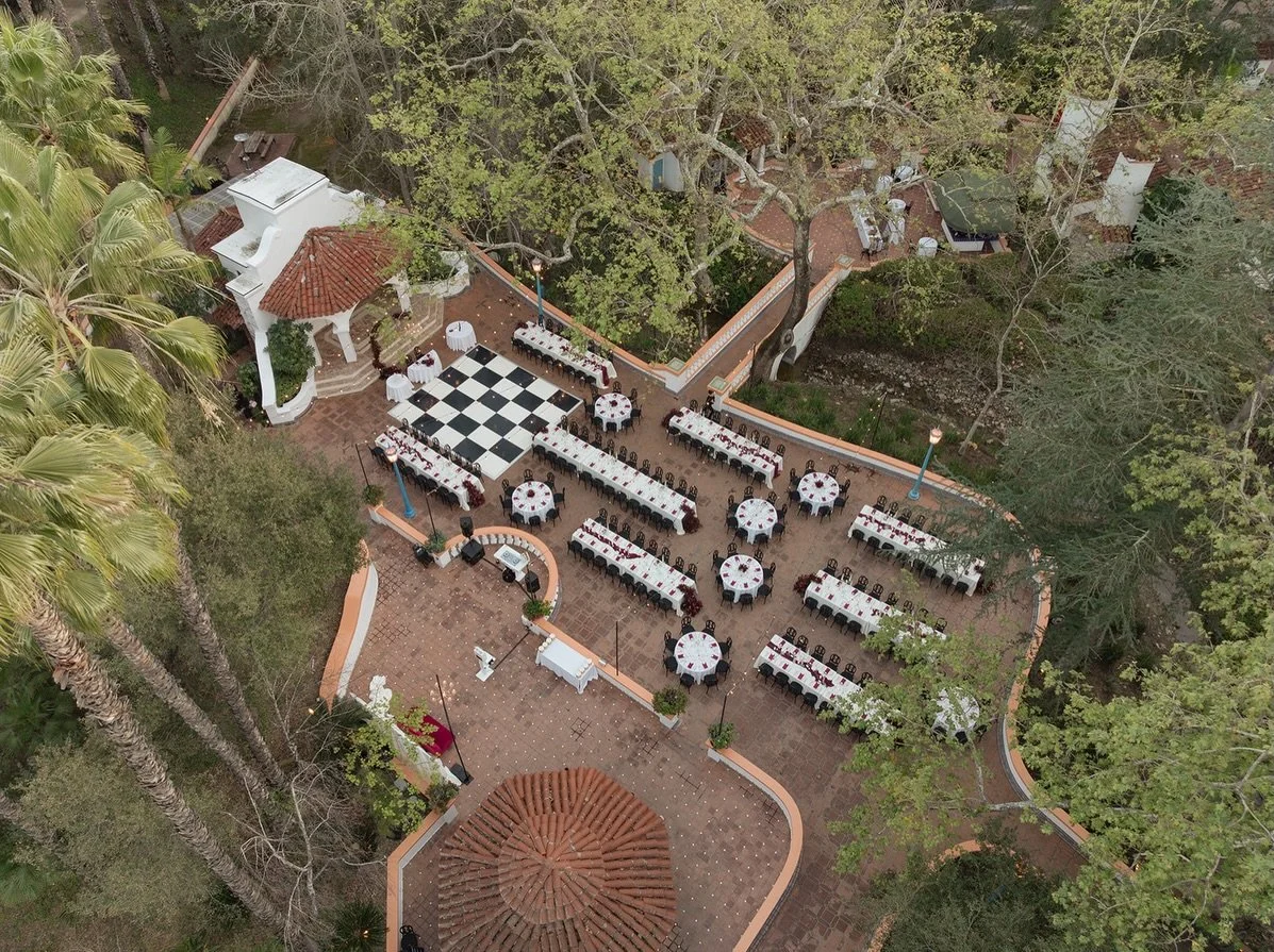An overhead look at Amir &amp; Irene&rsquo;s Rancho Las Lomas reception. Every table, candle, and floral cluster designed to frame that black-and-white dance floor and canyon views.

Reception at Rancho Las Lomas in Silverado, CA. Planning your 2025&
