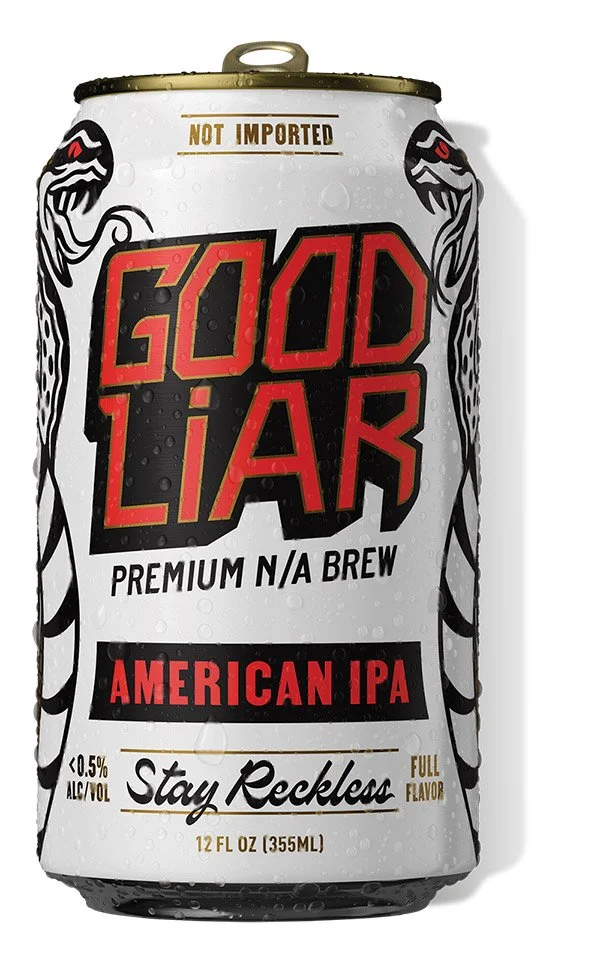 A 12-ounce can of Good Liar American IPA craft beer with a white background, black and red text, and a stylized dragon illustration on each side of the can.