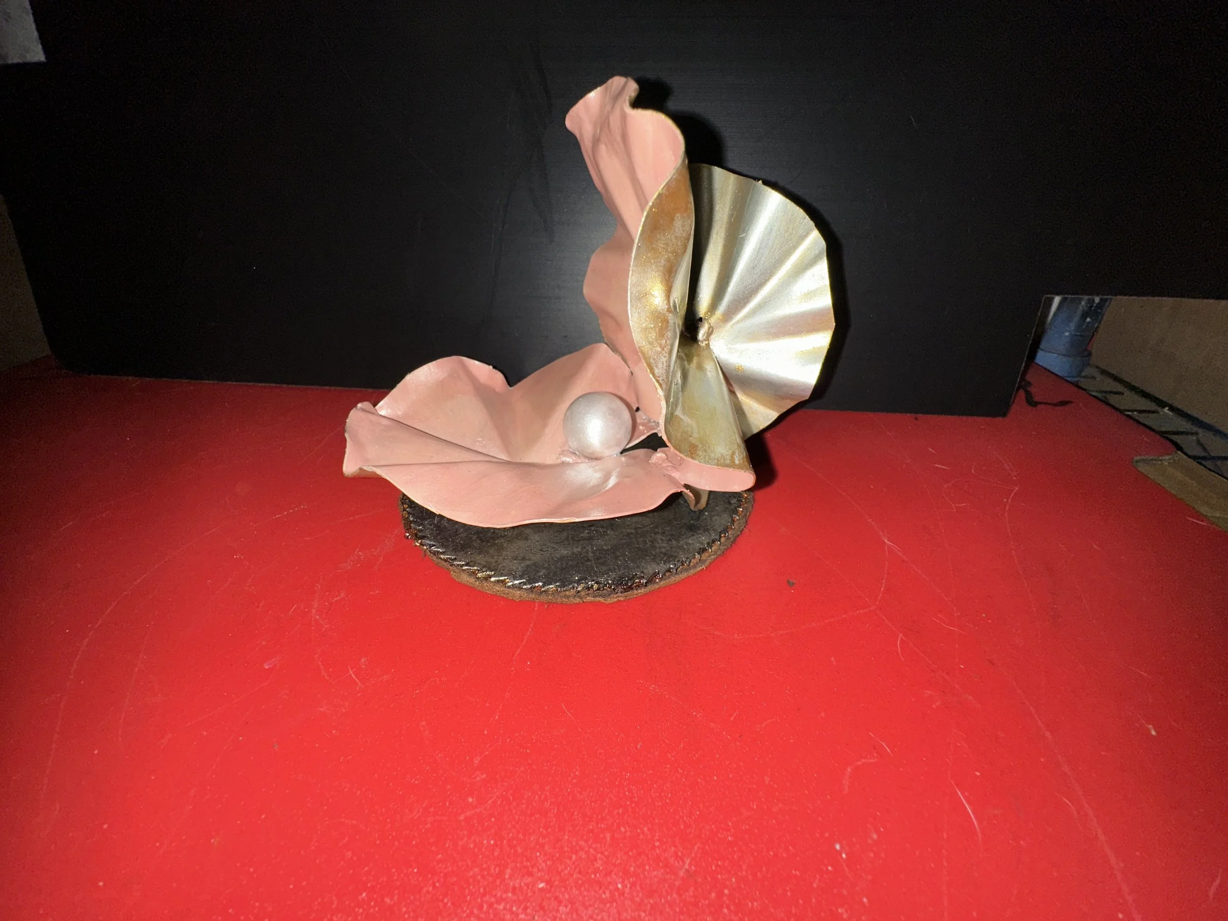 Scrap metal oyster, ball bearing pearl and saw blade base