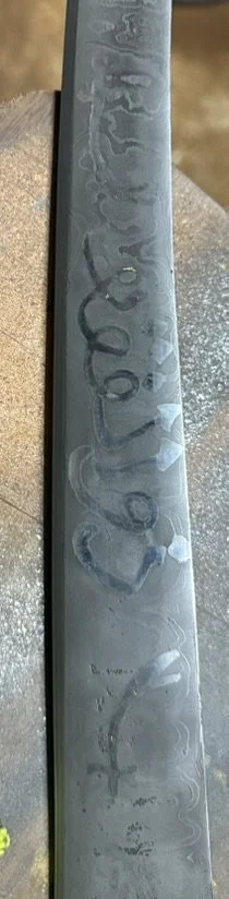 Freehand written Arabic prior to etching