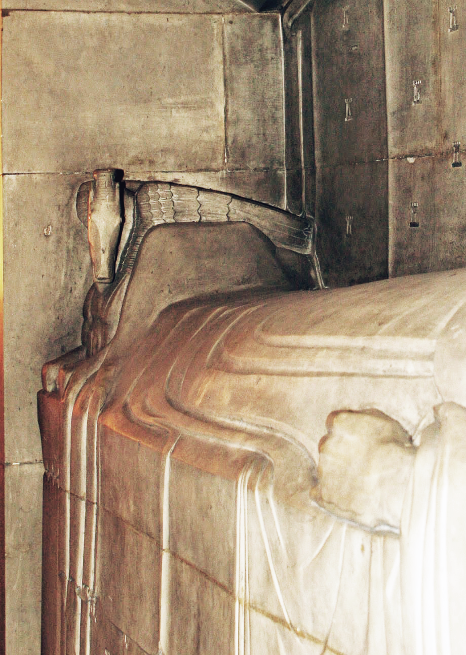 Pegasus, at his feet.  He symbolizes creativity.