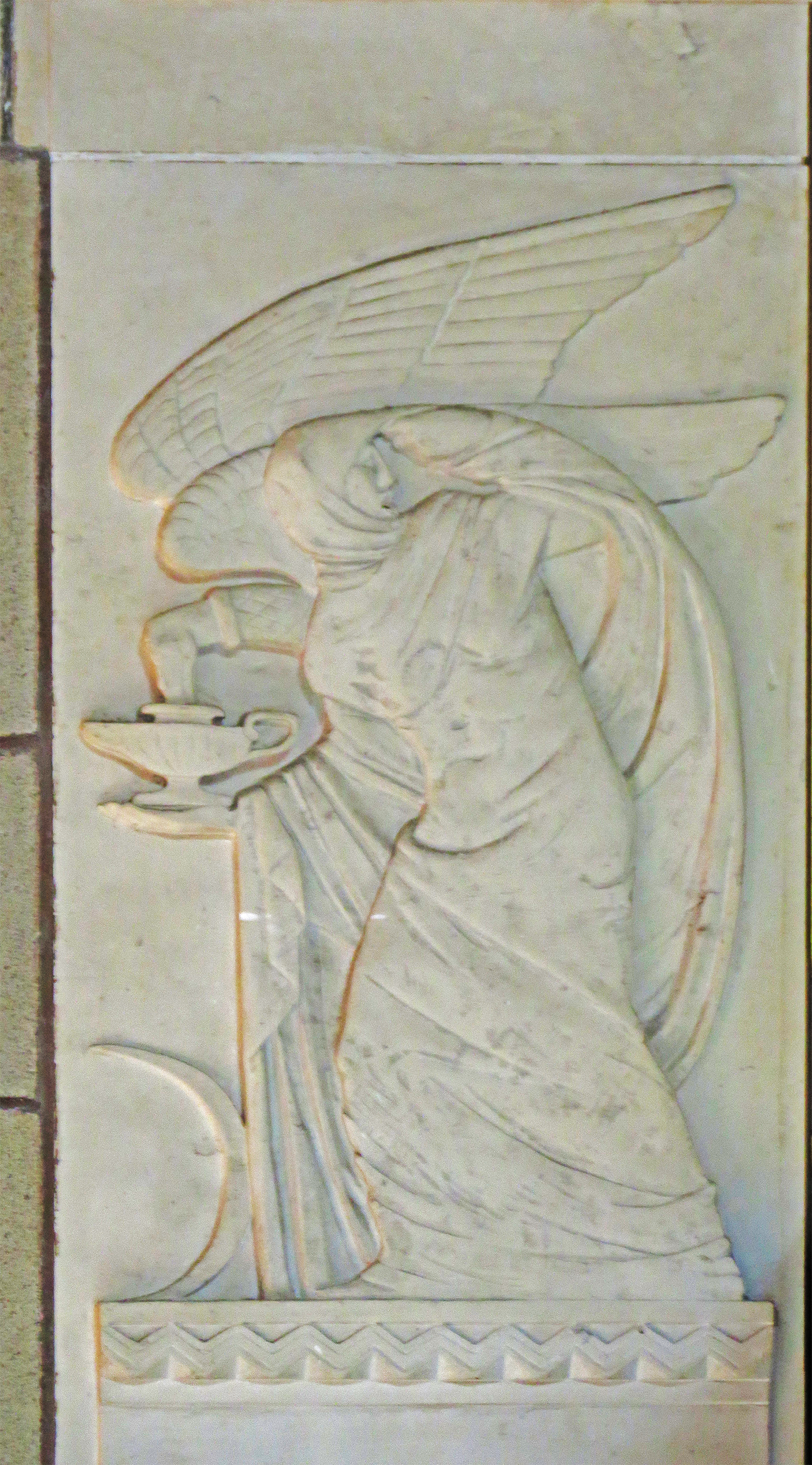 Angel with a lamp.