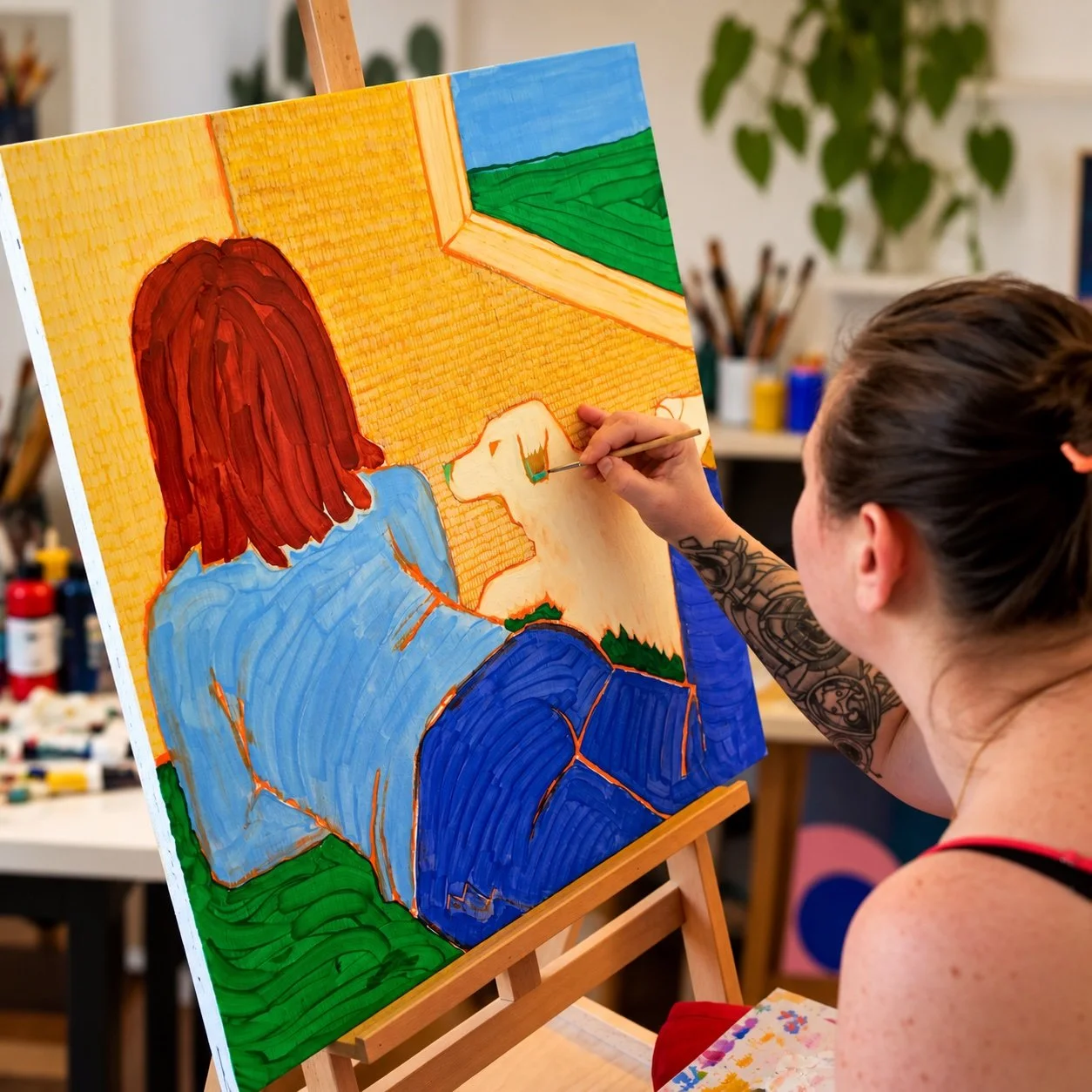 Artist at work in studio.