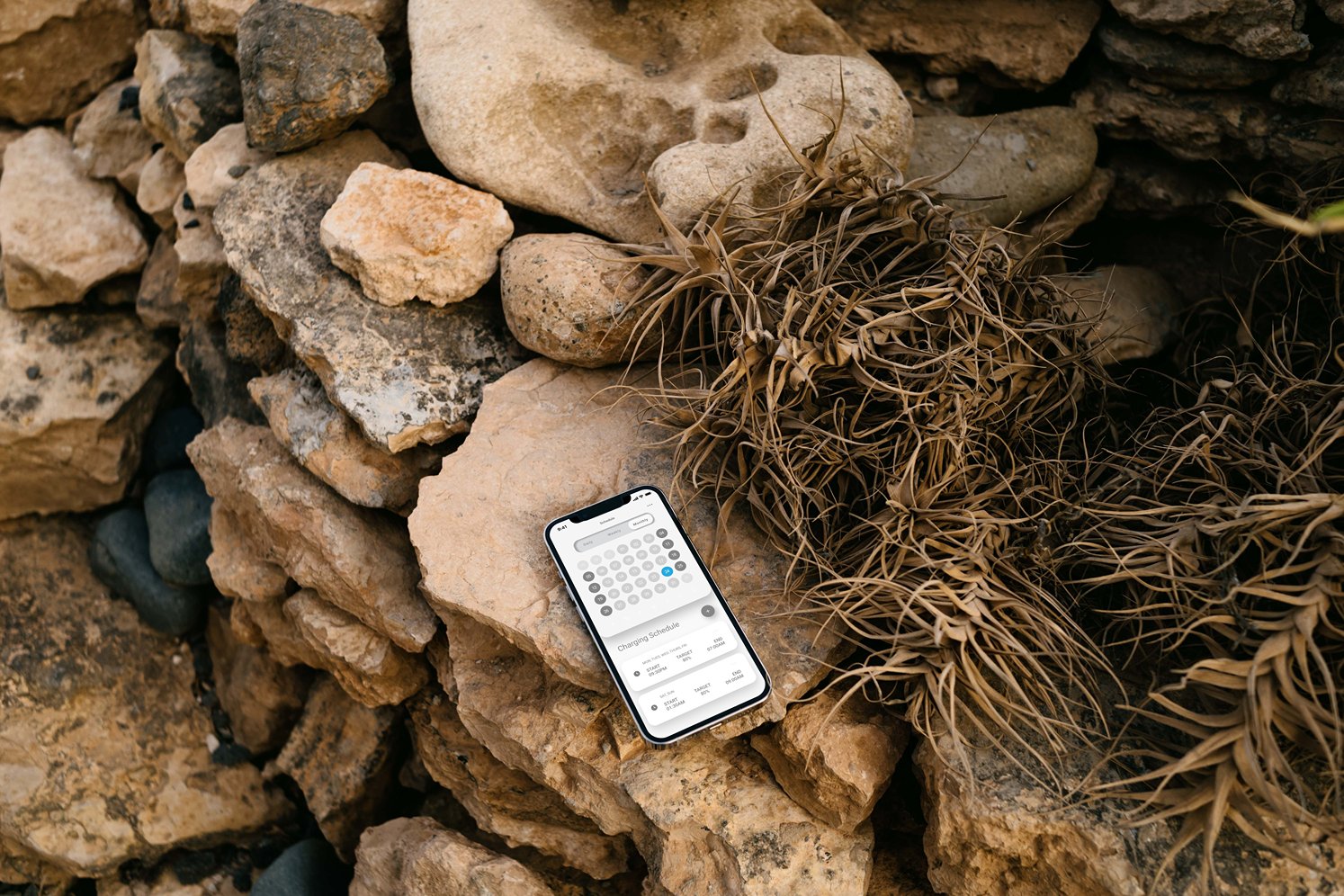 mockuuups-iphone-13-pro-mockup-on-stacked-rocks.jpeg