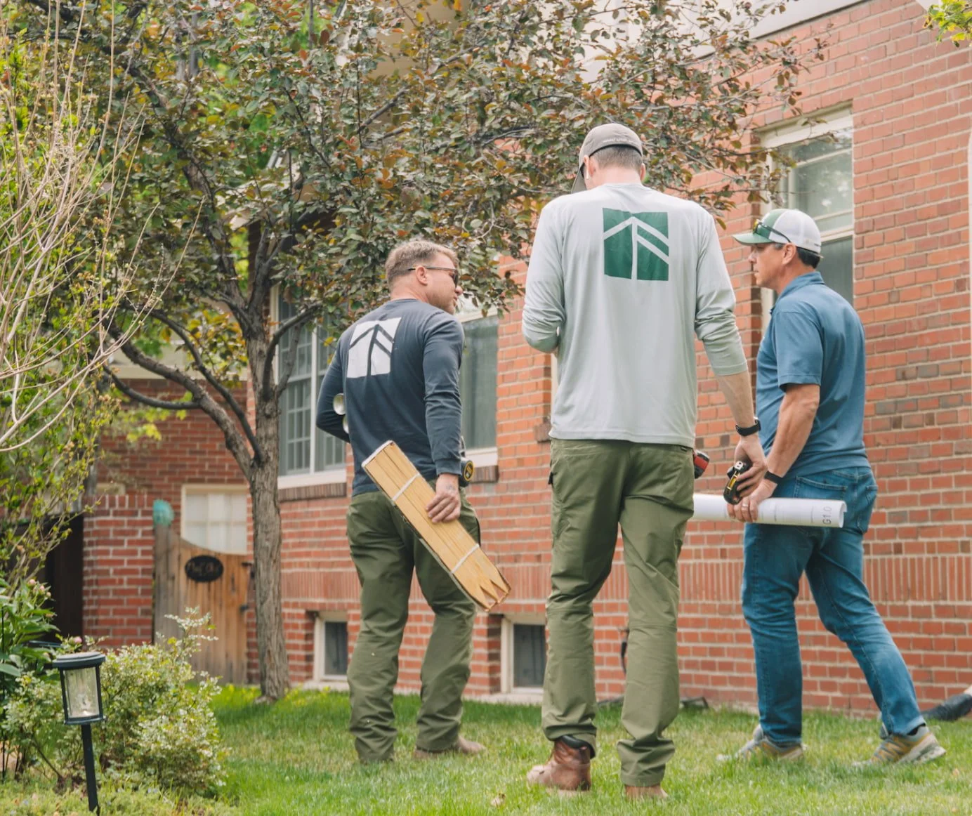 3 Men working on a custom home project in Denver