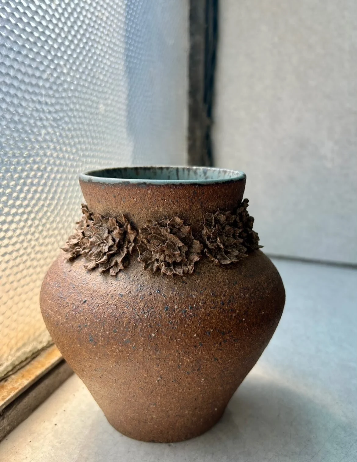 Flower crowned vessel #thepotterystudio #ceramics