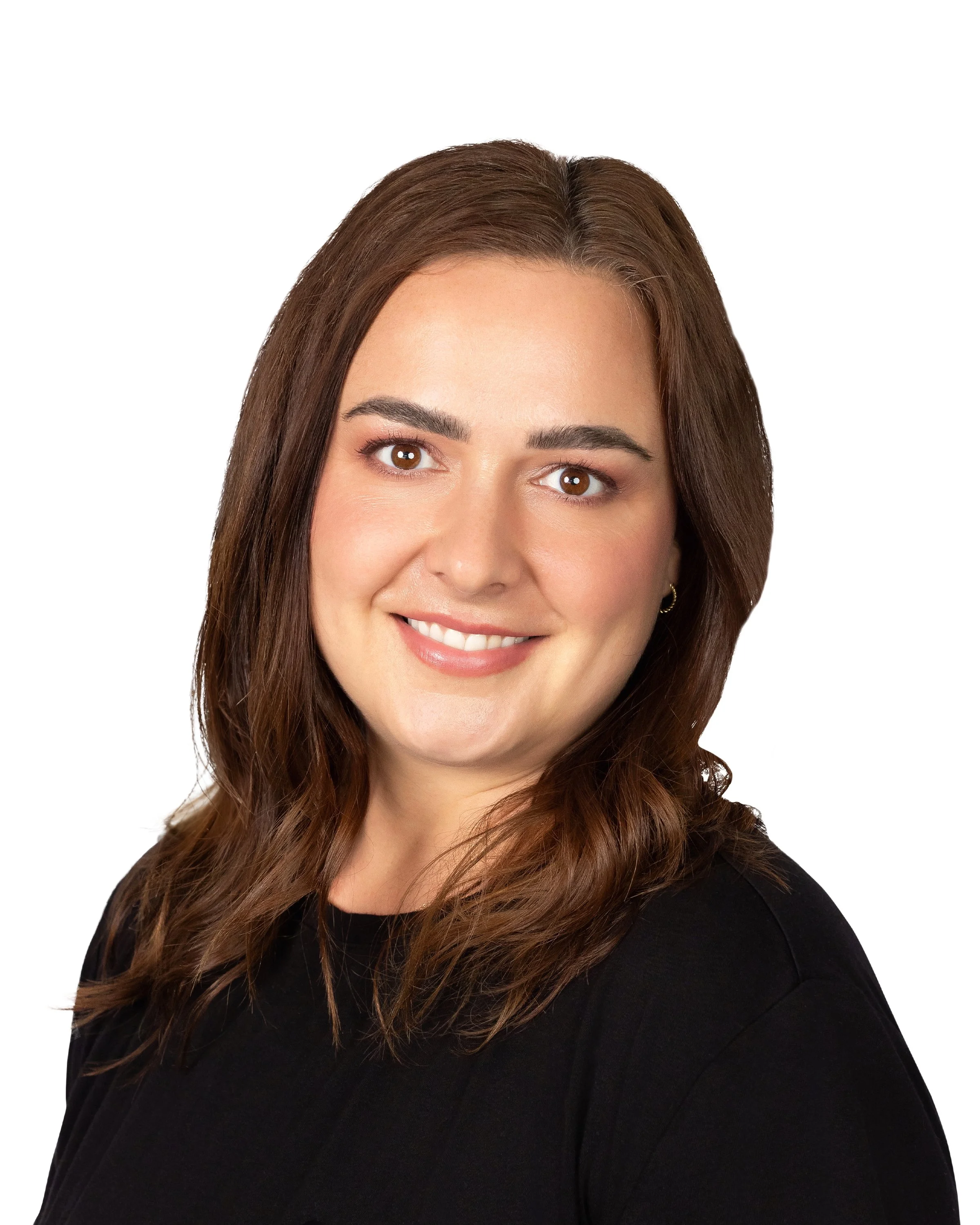 Professional headshot of a smiling woman with brown hair, wearing a black top, against a white background.