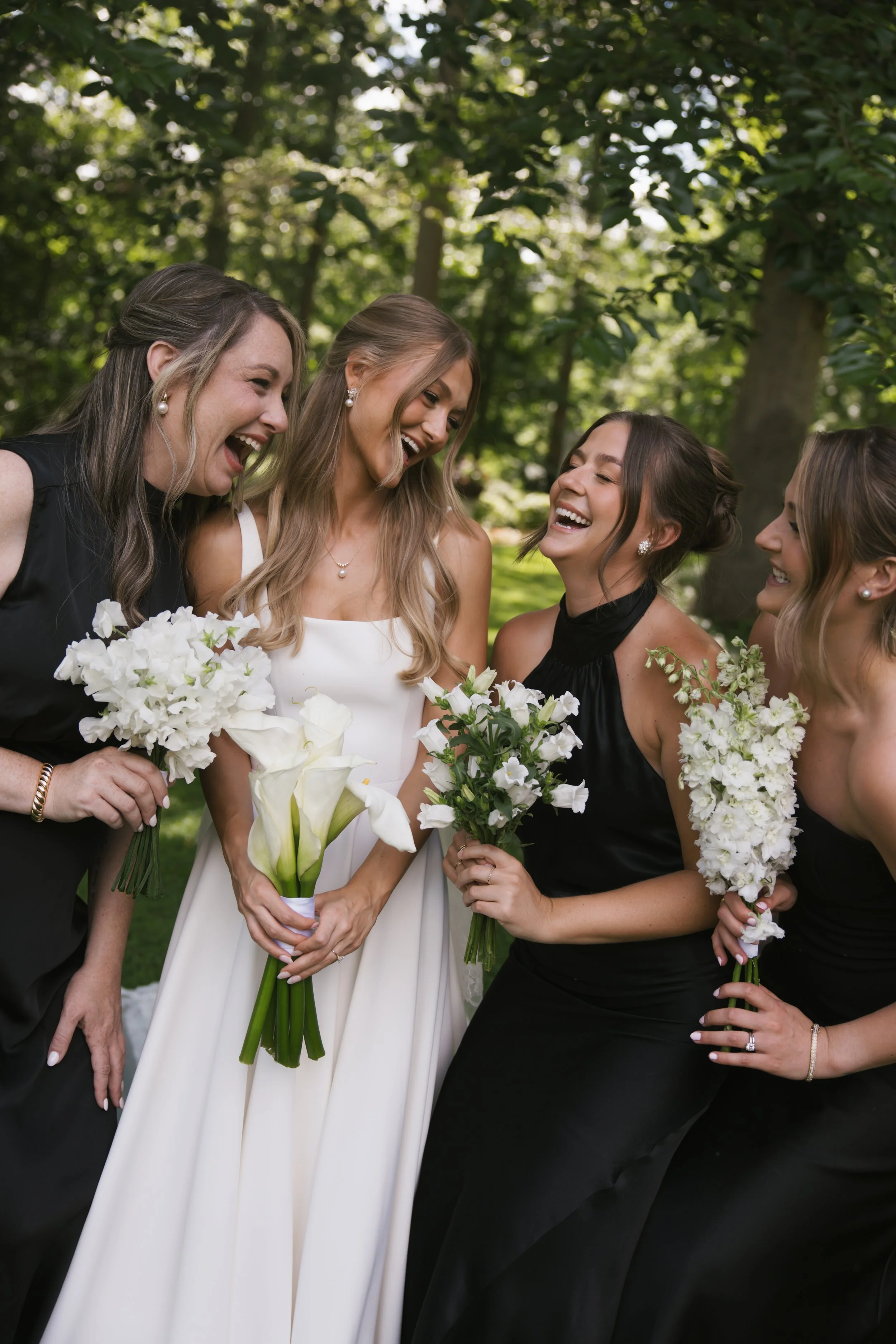 Tessa Laughing Bridesmaids with Decomposed Bouquets.jpeg
