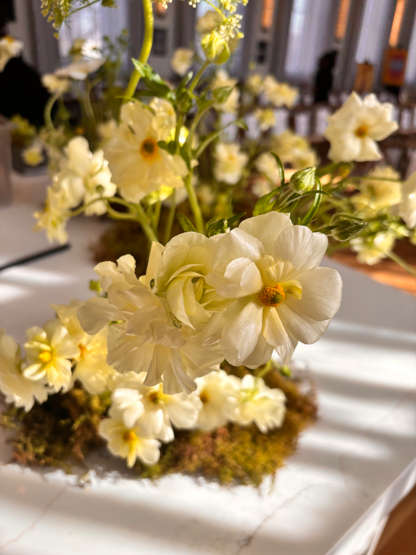 moss butterfly ranunculus fashion week non traditional modern floristry.png