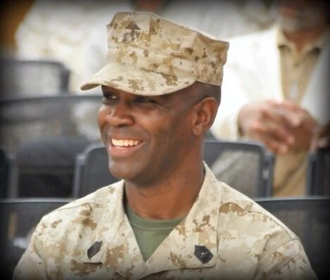 The Retired Marine smiles...