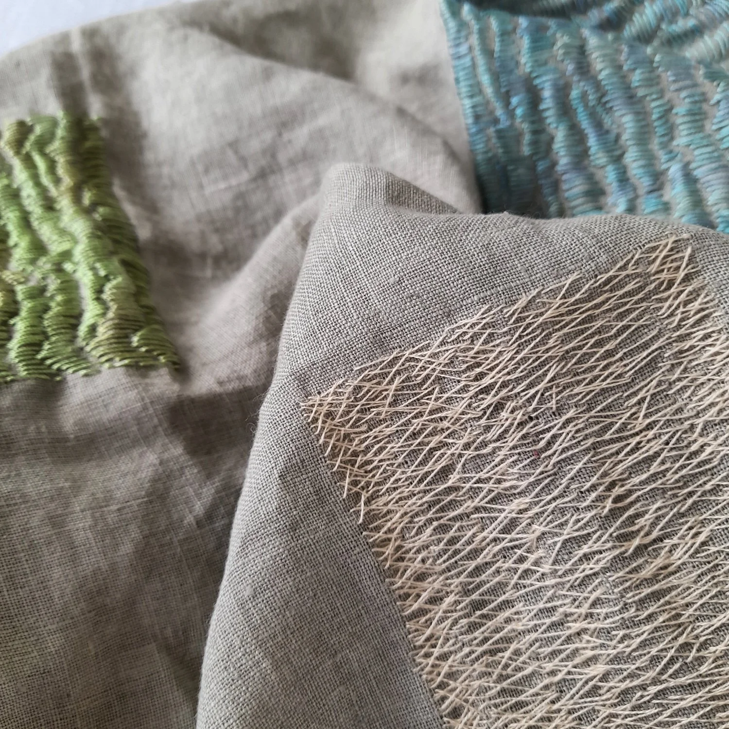 Stitching detail (linen fabric, silk and cotton thread)