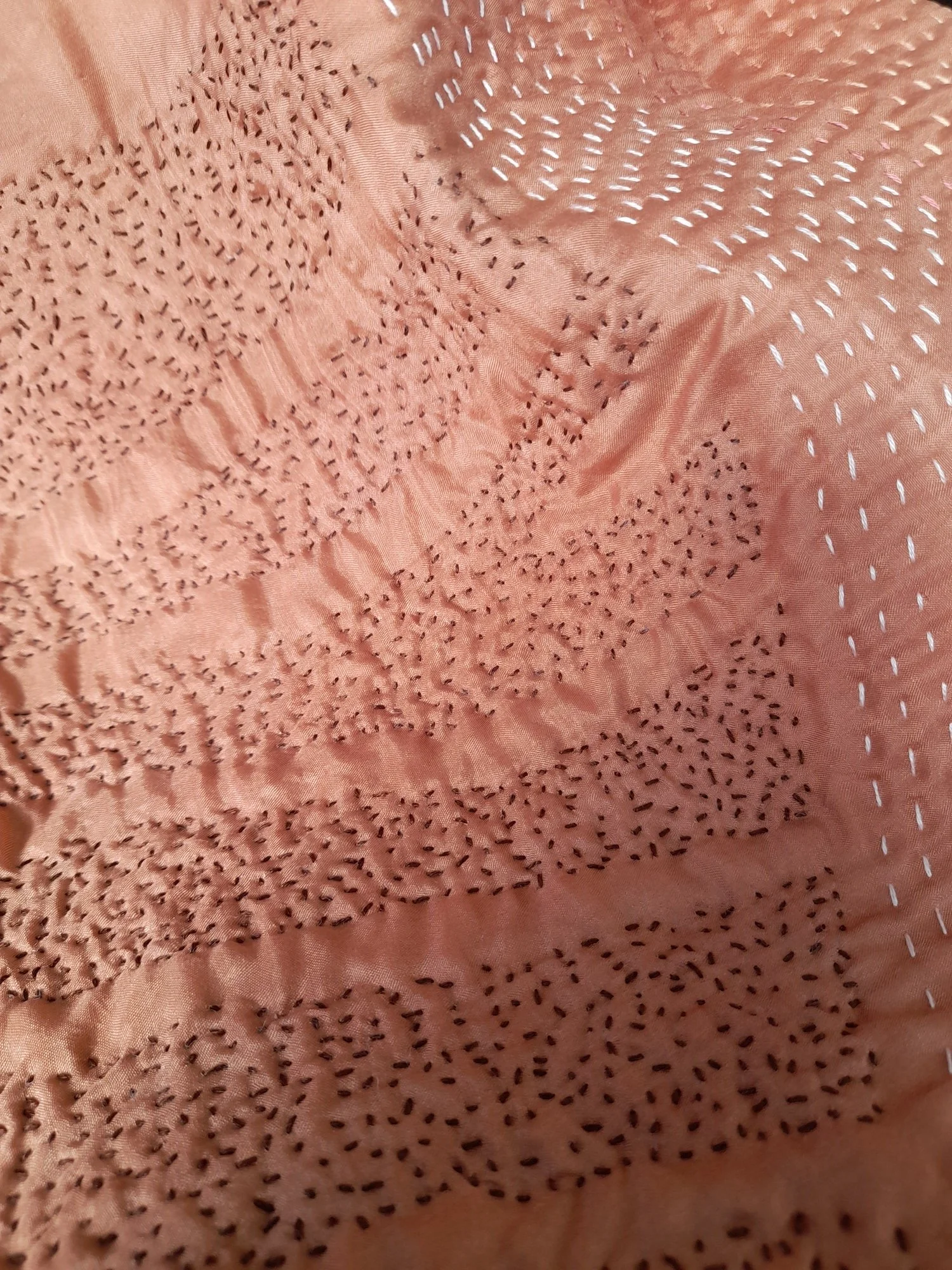 Stitching detail (avocado dyed silk fabric)