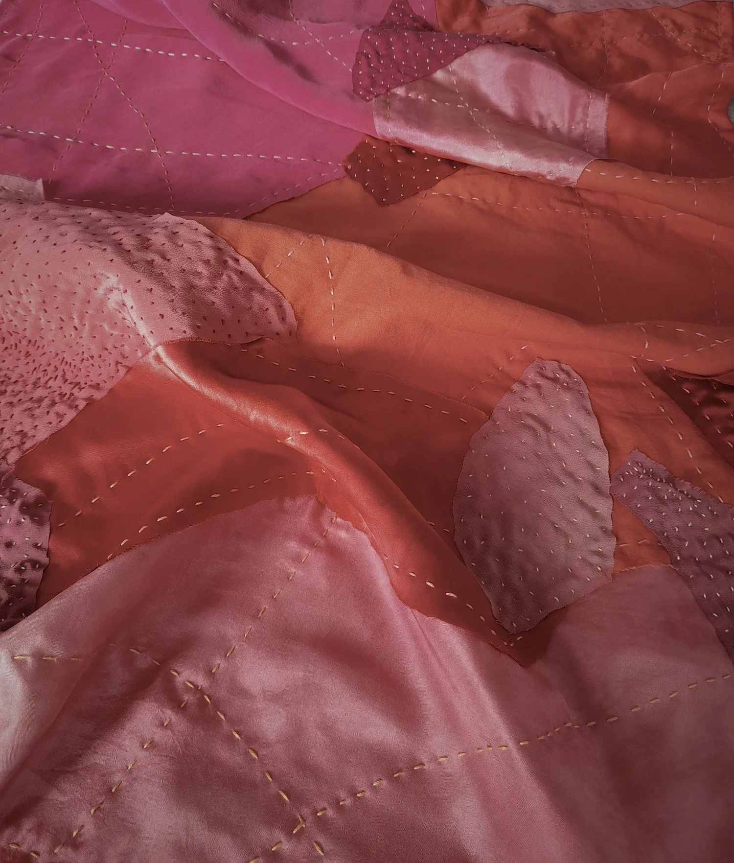 Quilt detail (silk fabric, cotton thread)