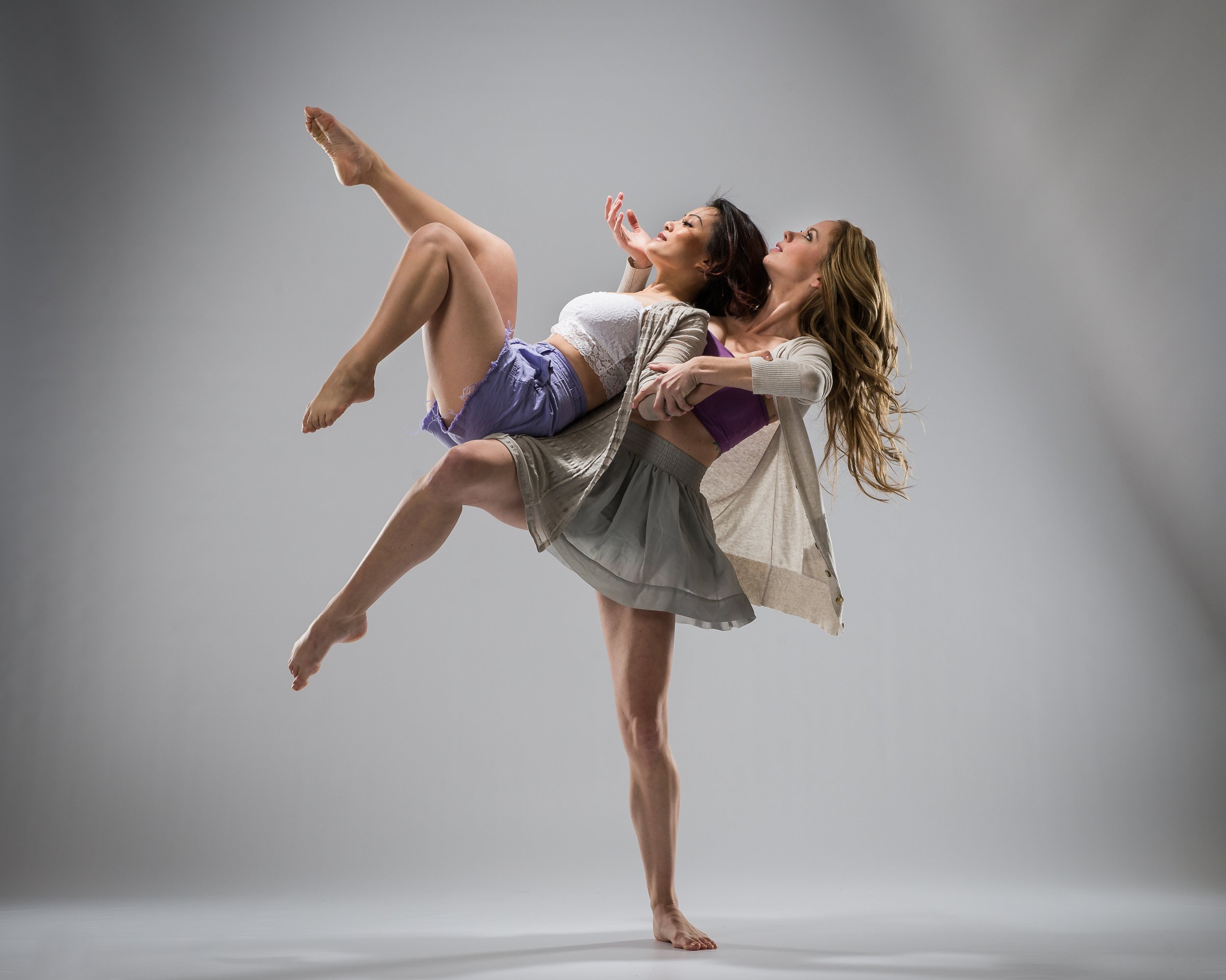Two young modern ballet dancers on gray studio background Stock Photo by  ©vova130555@gmail.com 75808461
