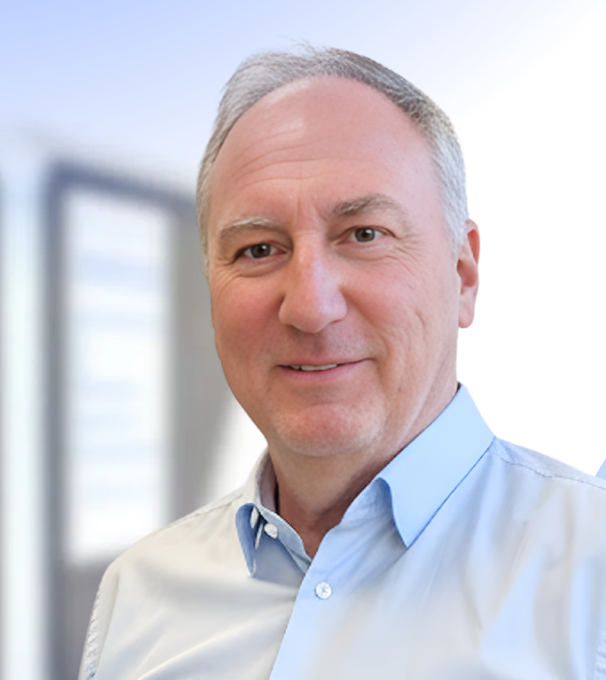 Prof. Dr. med. Jörg Debatin, new Chairman of LIMAA Technologies Board, smiling professional portrait in light blue shirt against office background