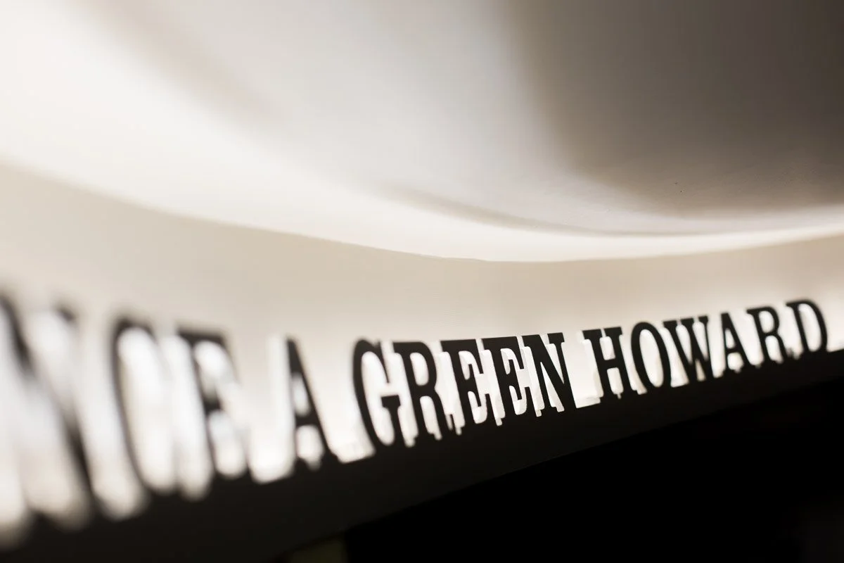 detail of green Howards sign