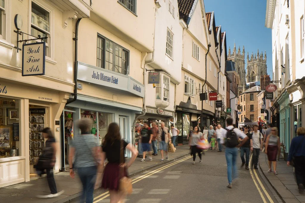 york street scene with minster in the distance on a sunny day