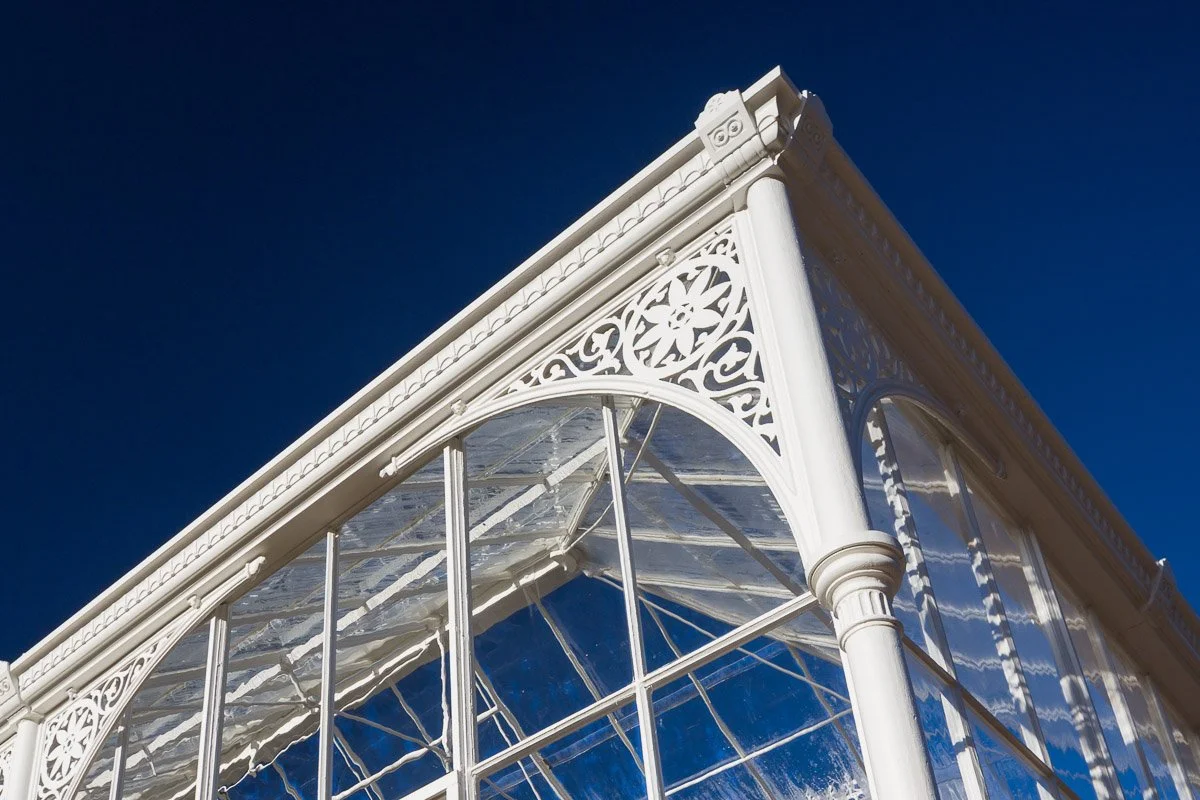 architectural detail of a metal frame extravagant greenhouse  