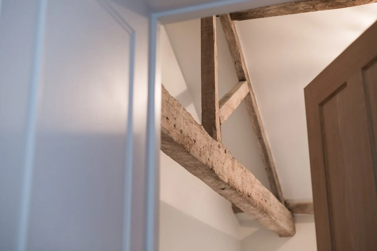 detail through doorway of ceiling beams