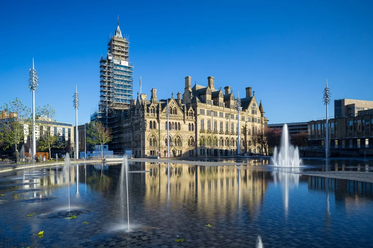 bradford city hall in the sun from across fountain