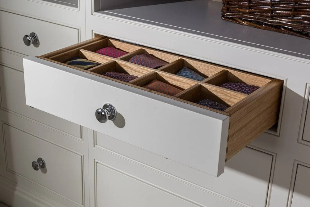 pale blue grey dresser unit with open draw with dress tie dividers 