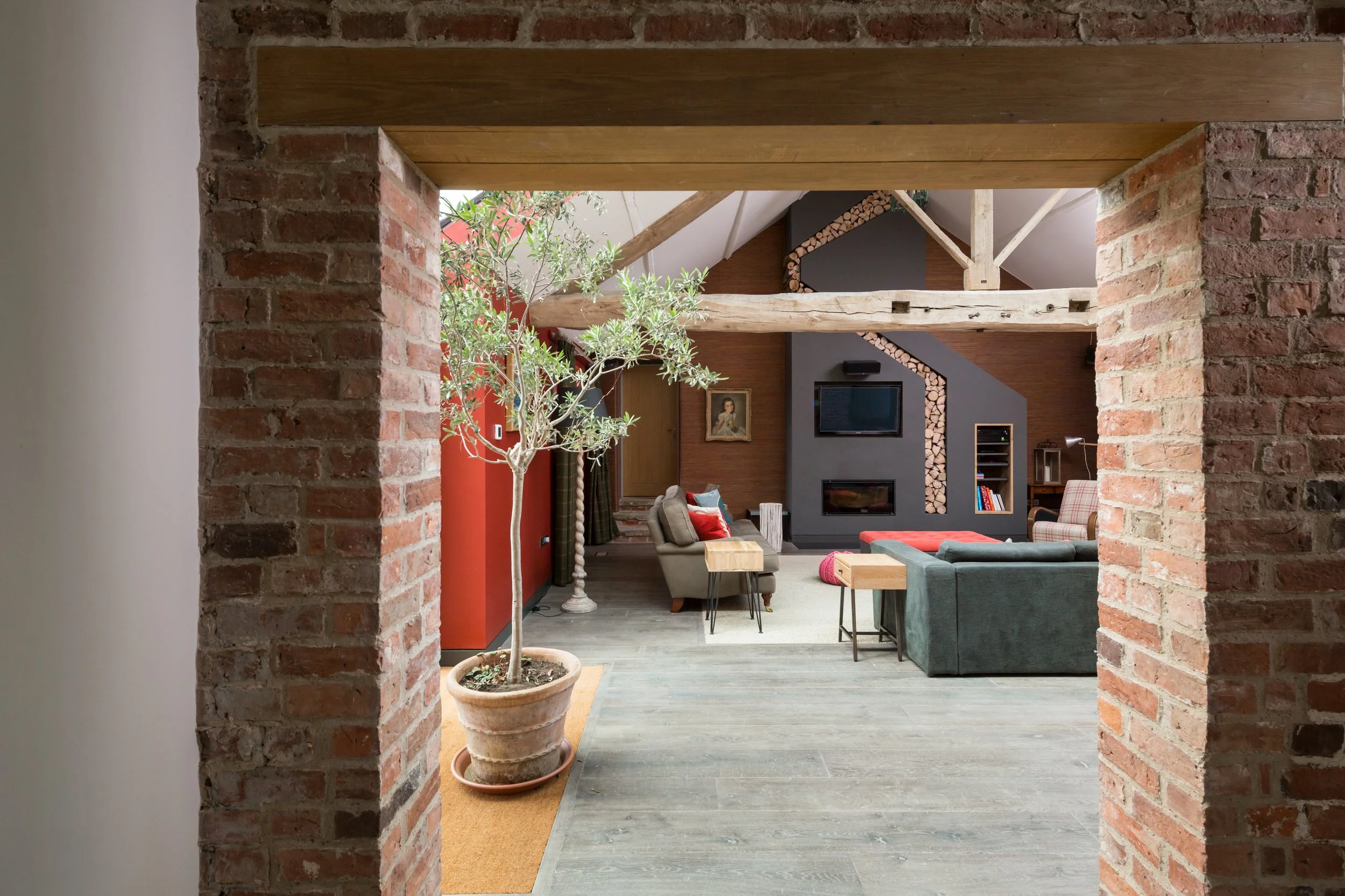Brick and oak opening into large lounge