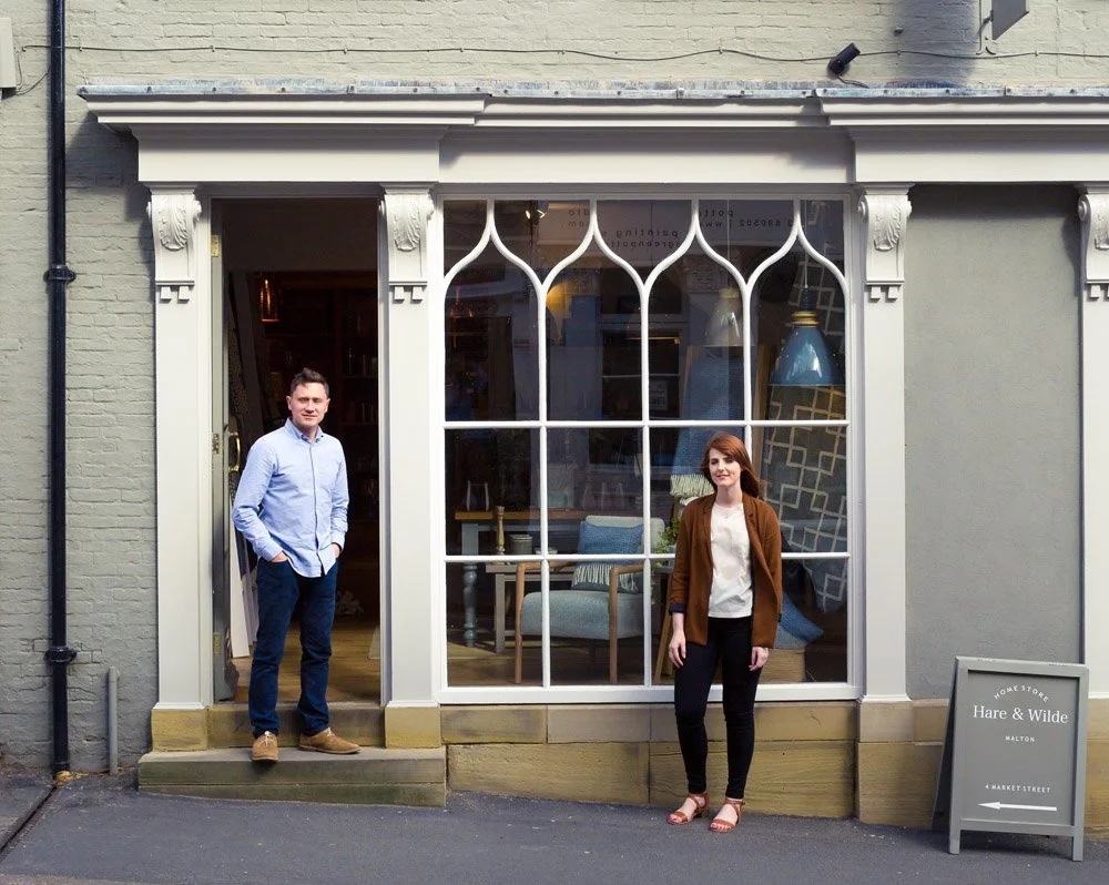 front shot including the owners of interior shop 'hare and wild'